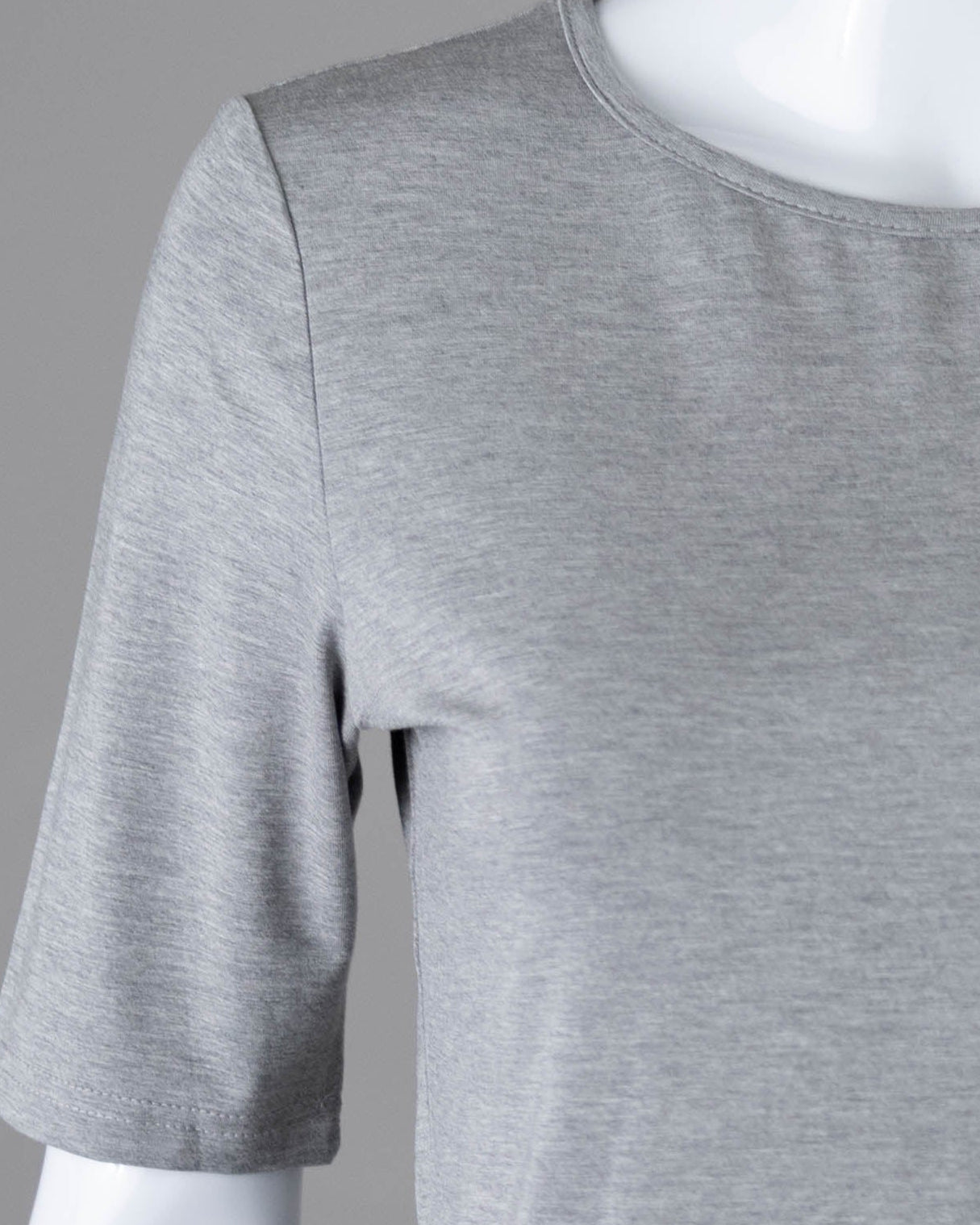 Model wearing Nuggles® Half Sleeve Essential Tee in Light Heather