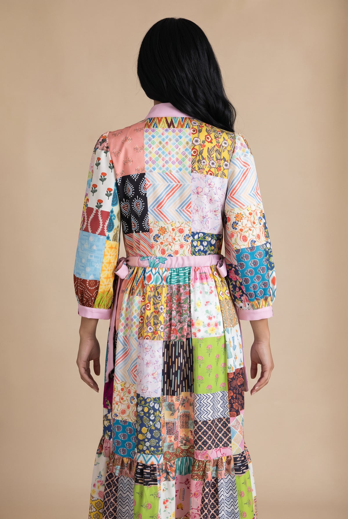 Model wearing Nuggles® Leila Dress in Memory Quilt