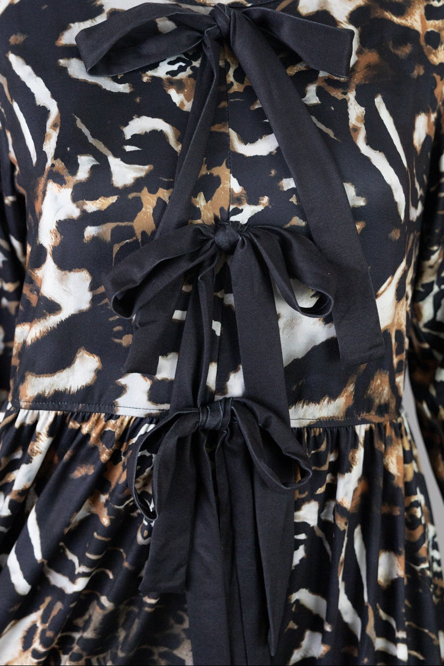 Model wearing Nuggles® Addison Dress in Midnight Safari