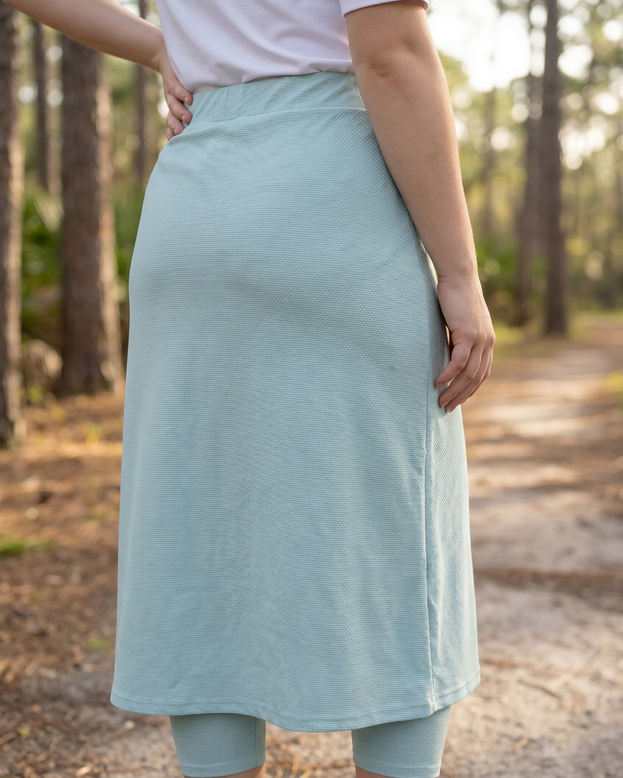 Model wearing Nuggles® 31" All-Sport Skirt in Mint