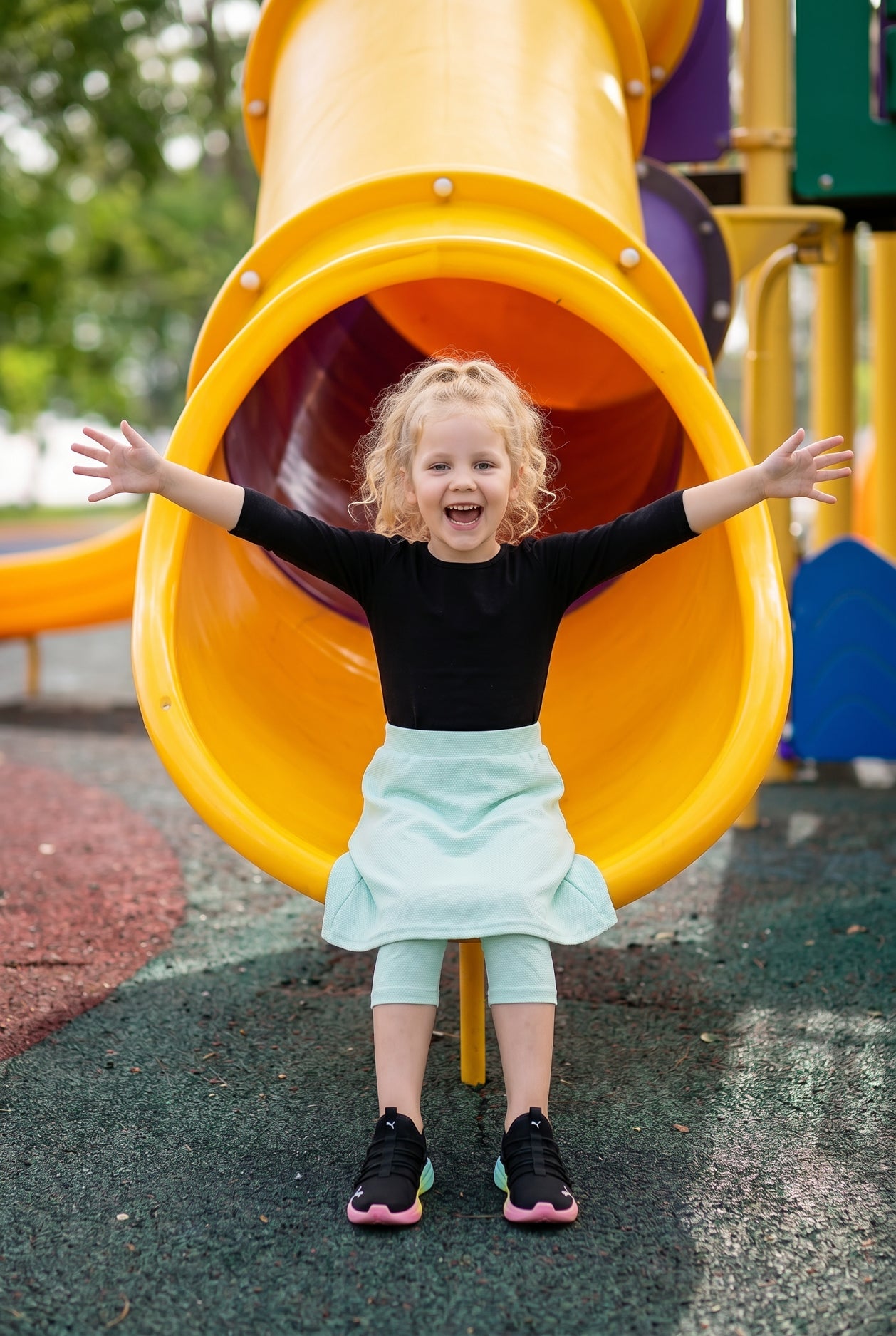 Model wearing Nuggles® Girls All-Sport Skirt in Mint