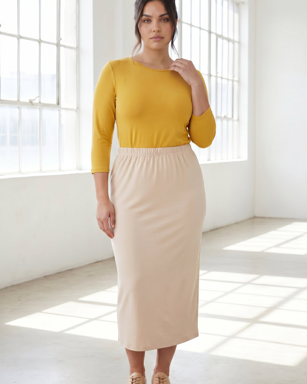 Model wearing Nuggles® 3/4 Essential Tee in Mustard
