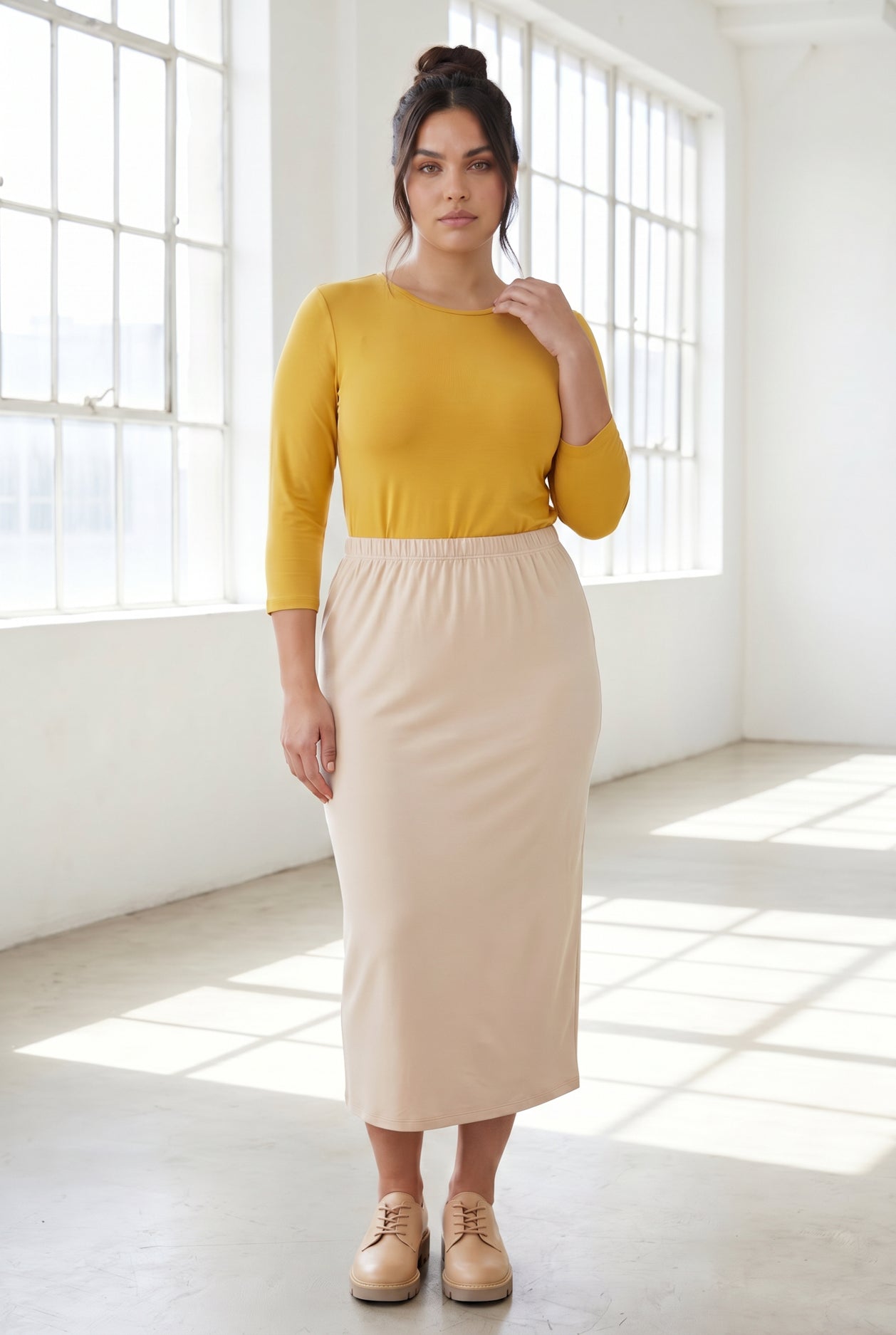 Model wearing Nuggles® 3/4 Essential Tee in Mustard
