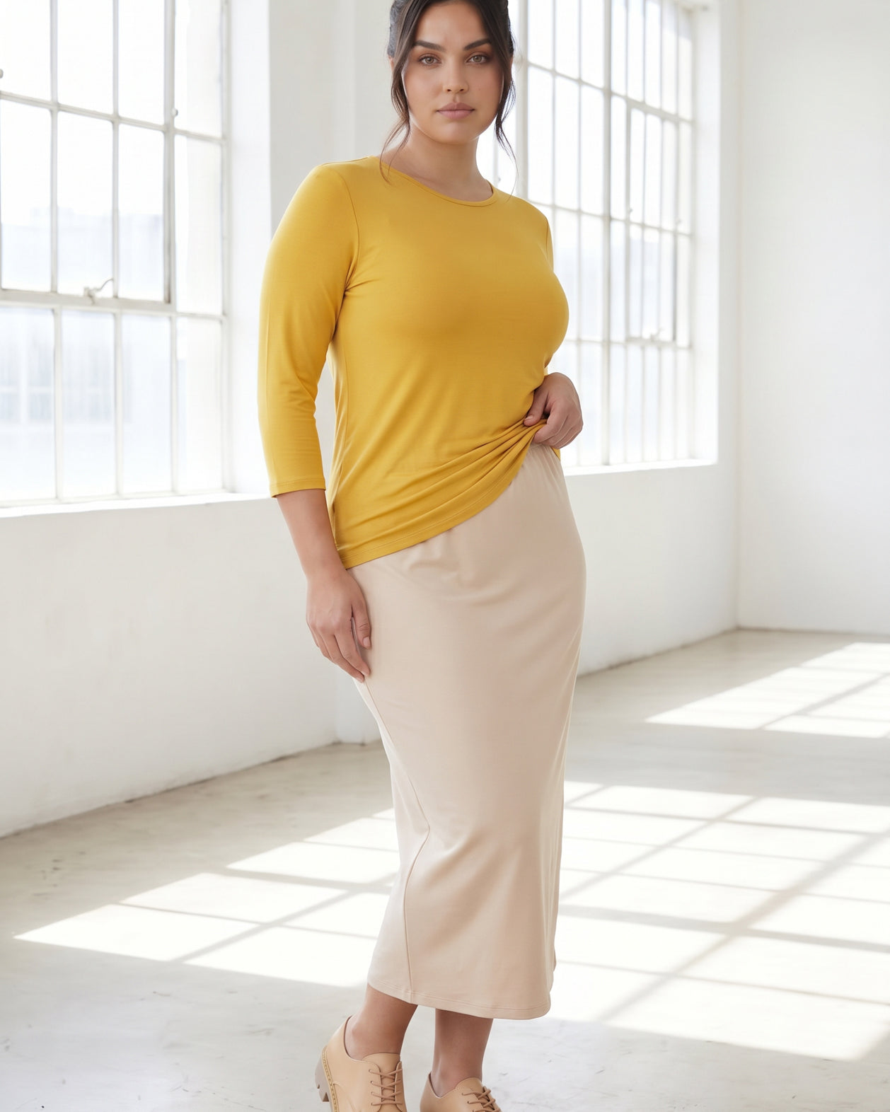 Model wearing Nuggles® 3/4 Essential Tee in Mustard