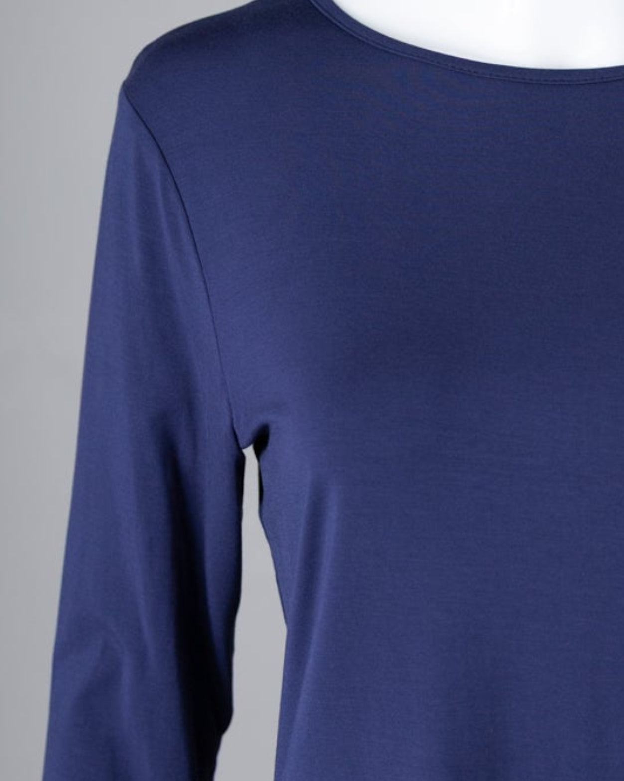 Model wearing Nuggles® 3/4 Essential Tee in Navy