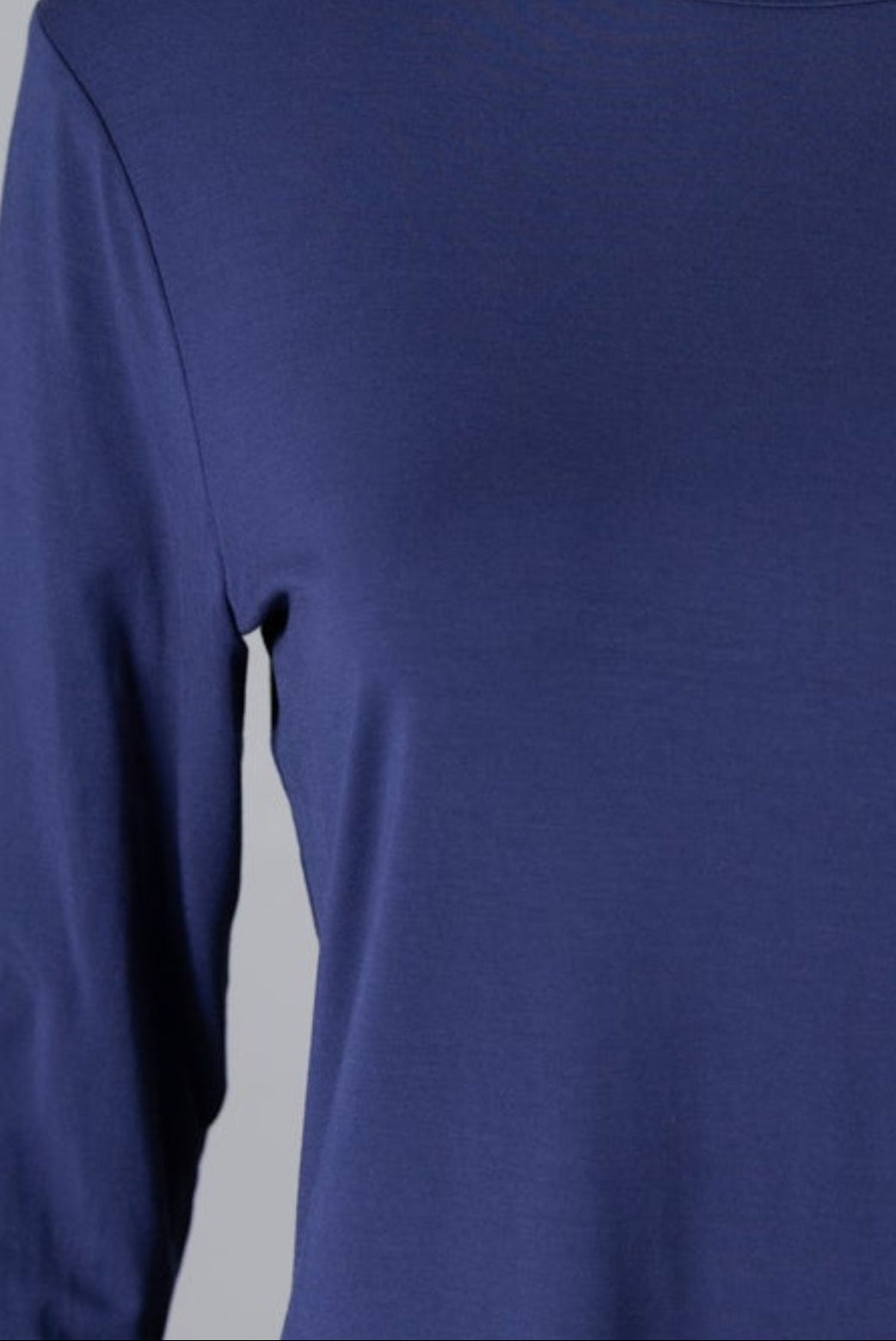 Model wearing Nuggles® 3/4 Essential Tee in Navy