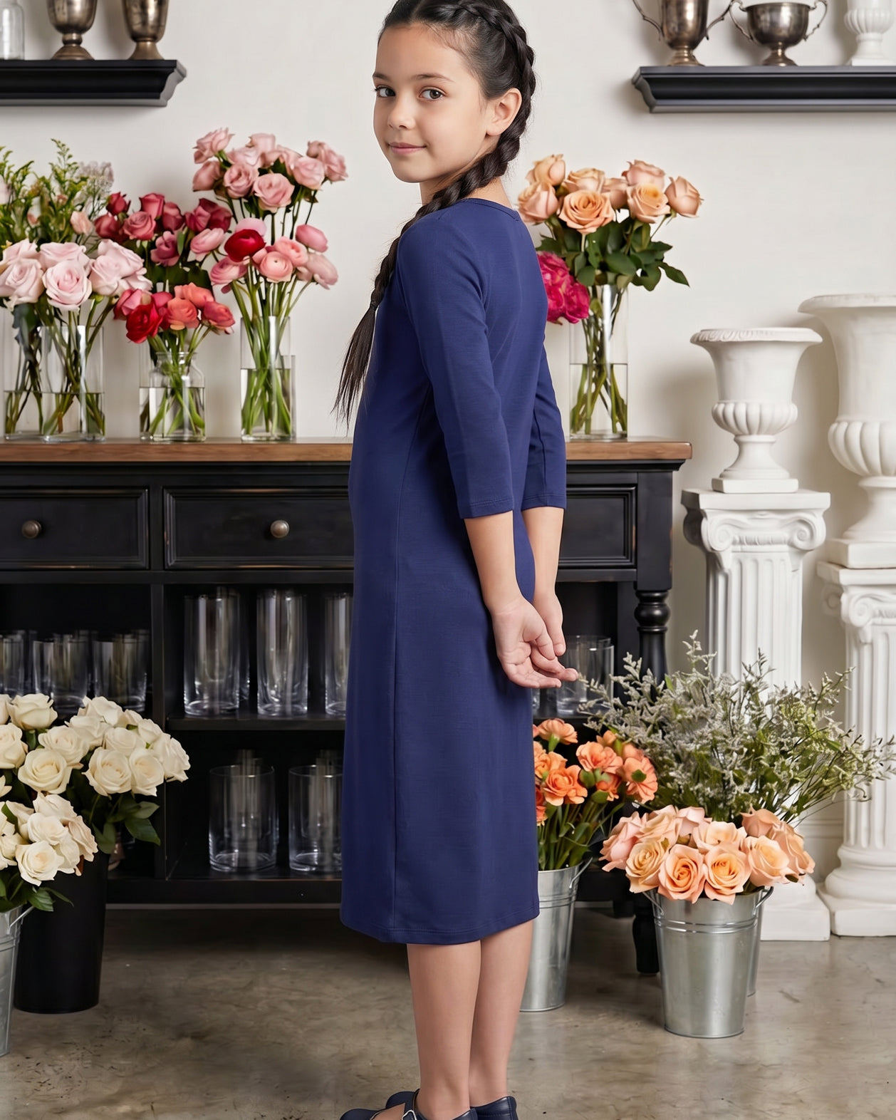 Model wearing Nuggles® Girls Midi Layering Dress in Navy