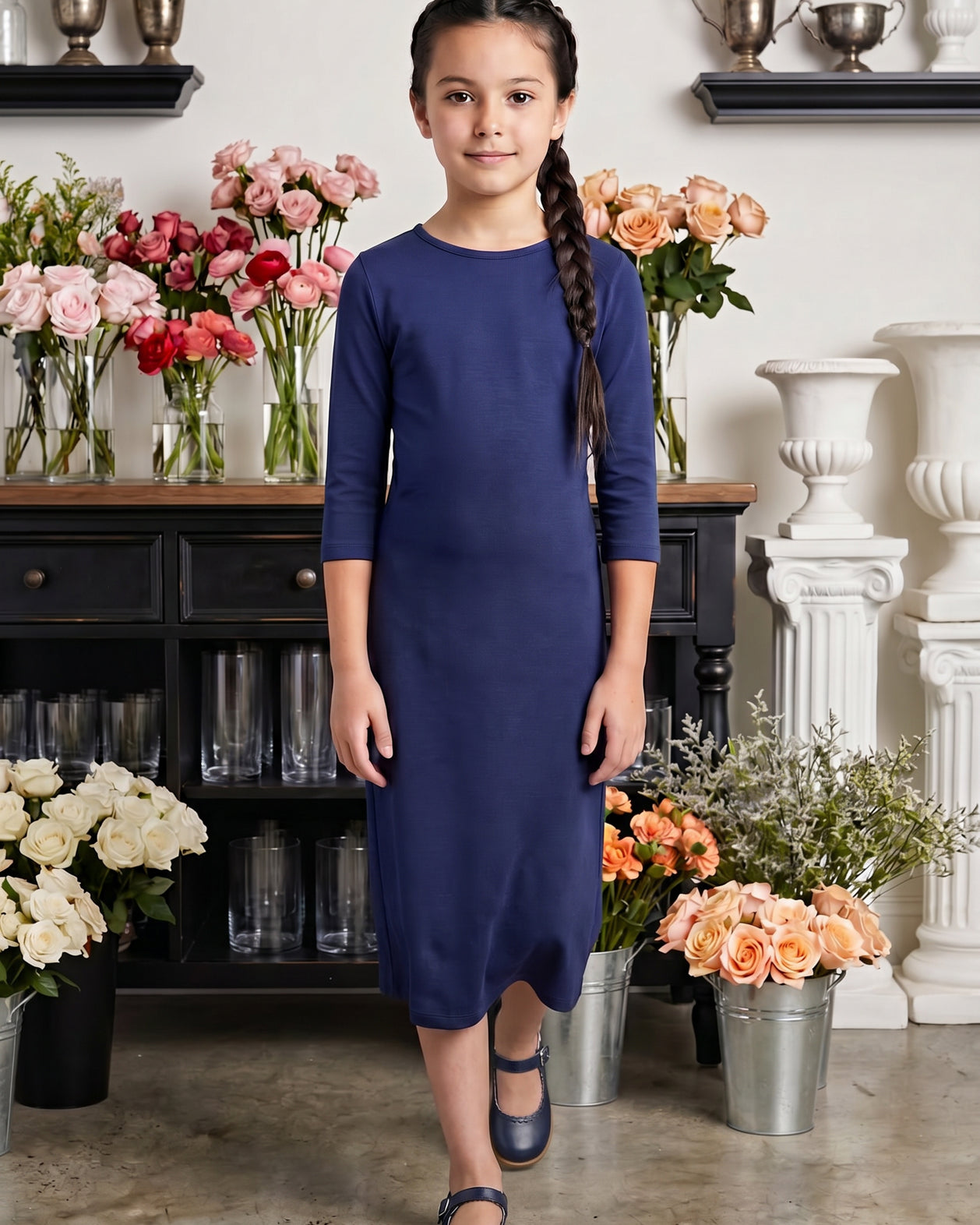 Model wearing Nuggles® Girls Midi Layering Dress in Navy