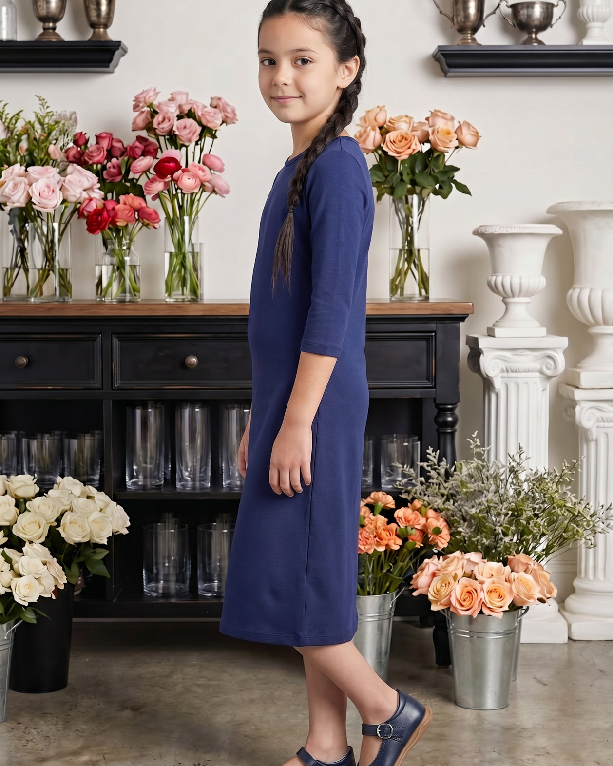 Model wearing Nuggles® Girls Midi Layering Dress in Navy