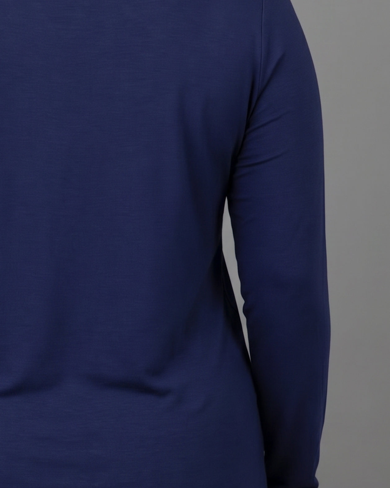 Model wearing Nuggles® Long Sleeve Essential Tee in Navy