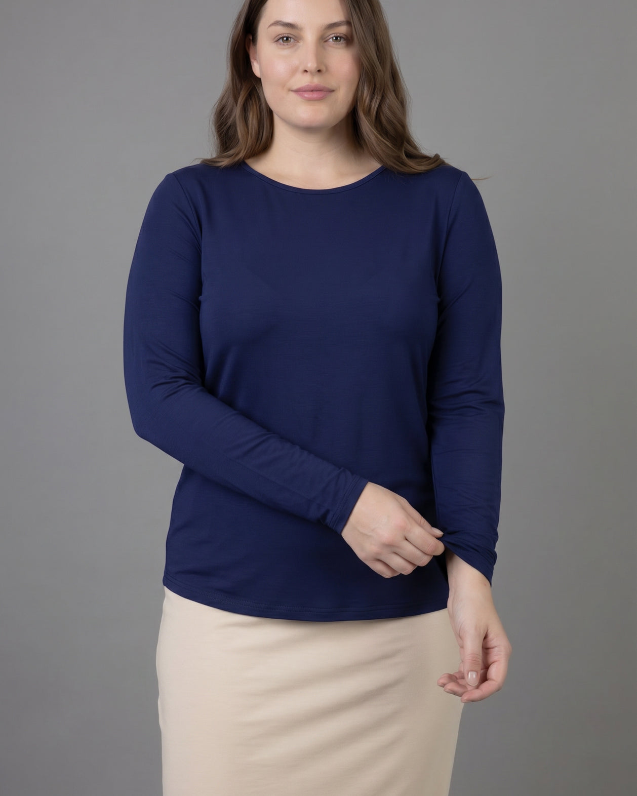 Model wearing Nuggles® Long Sleeve Essential Tee in Navy