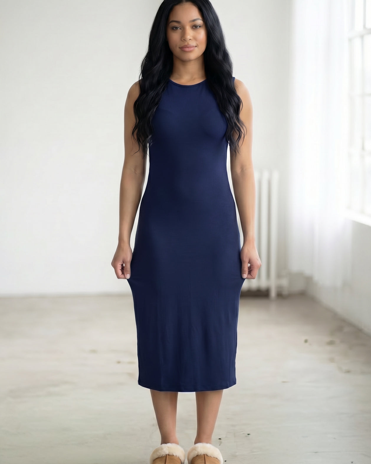 Model wearing Nuggles® Tank Midi Dress in Navy
