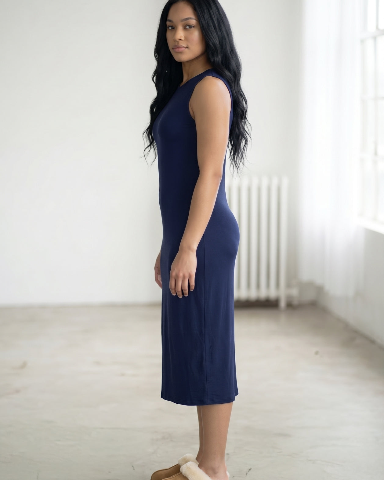 Model wearing Nuggles® Tank Midi Dress in Navy