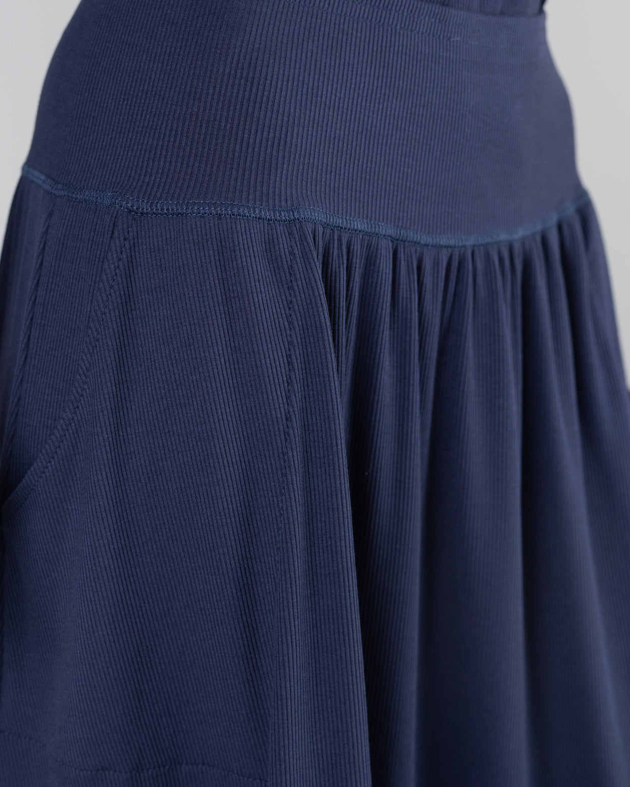 Model wearing Nuggles® Bethany Shirt & Skirt in Navy