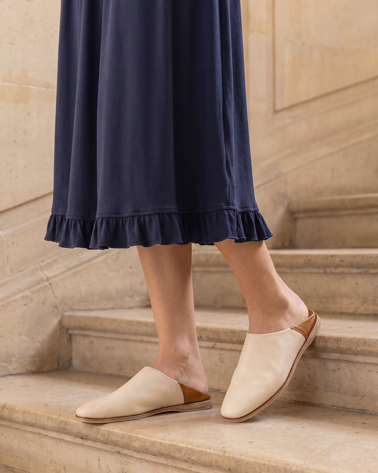 Model wearing Nuggles® Bethany Shirt & Skirt in Navy