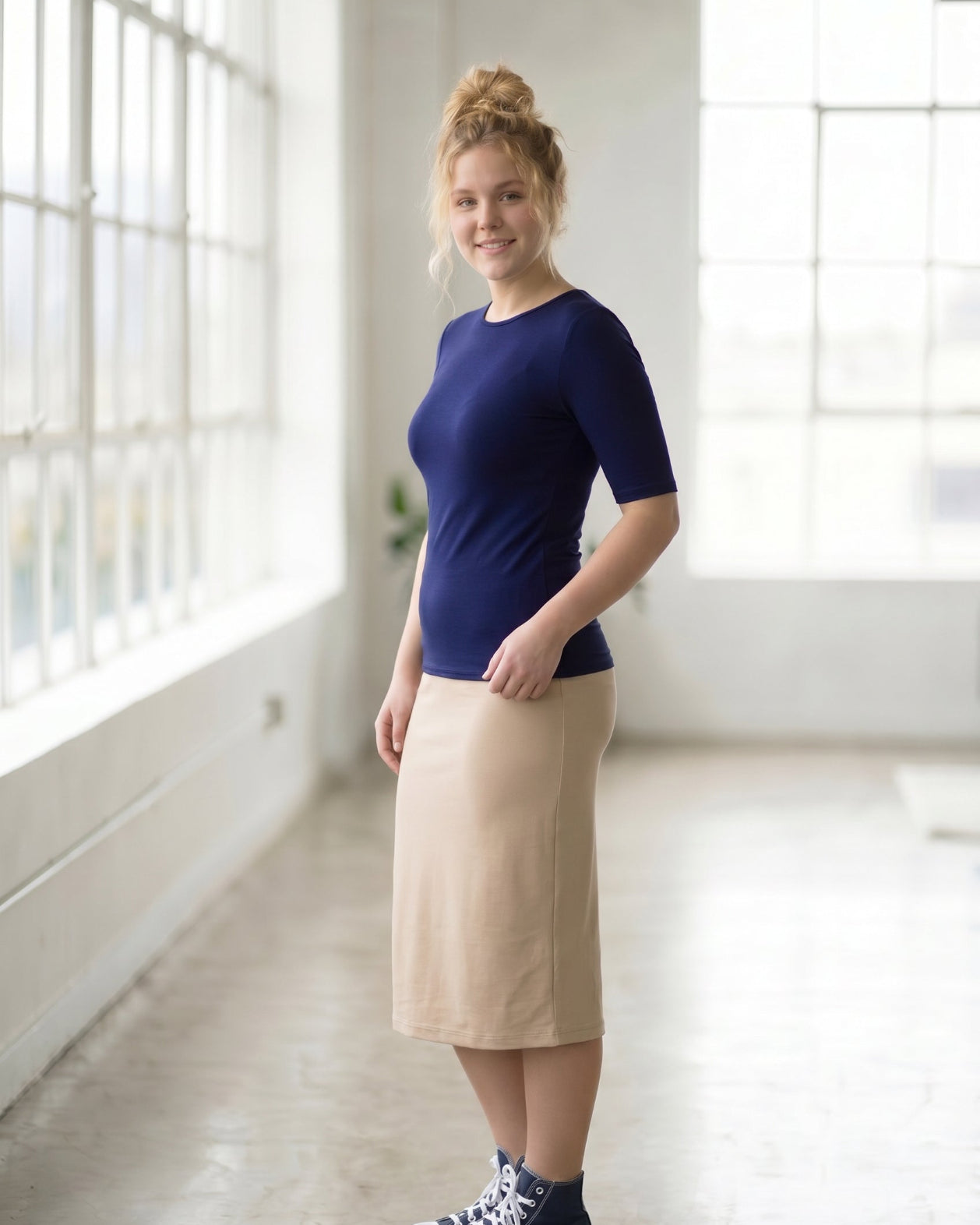 Model wearing the Nuggles® Essential Half Sleeve Tee in Navy
