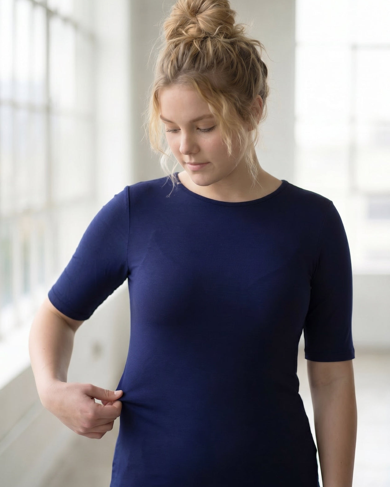 Model wearing the Nuggles® Essential Half Sleeve Tee in Navy