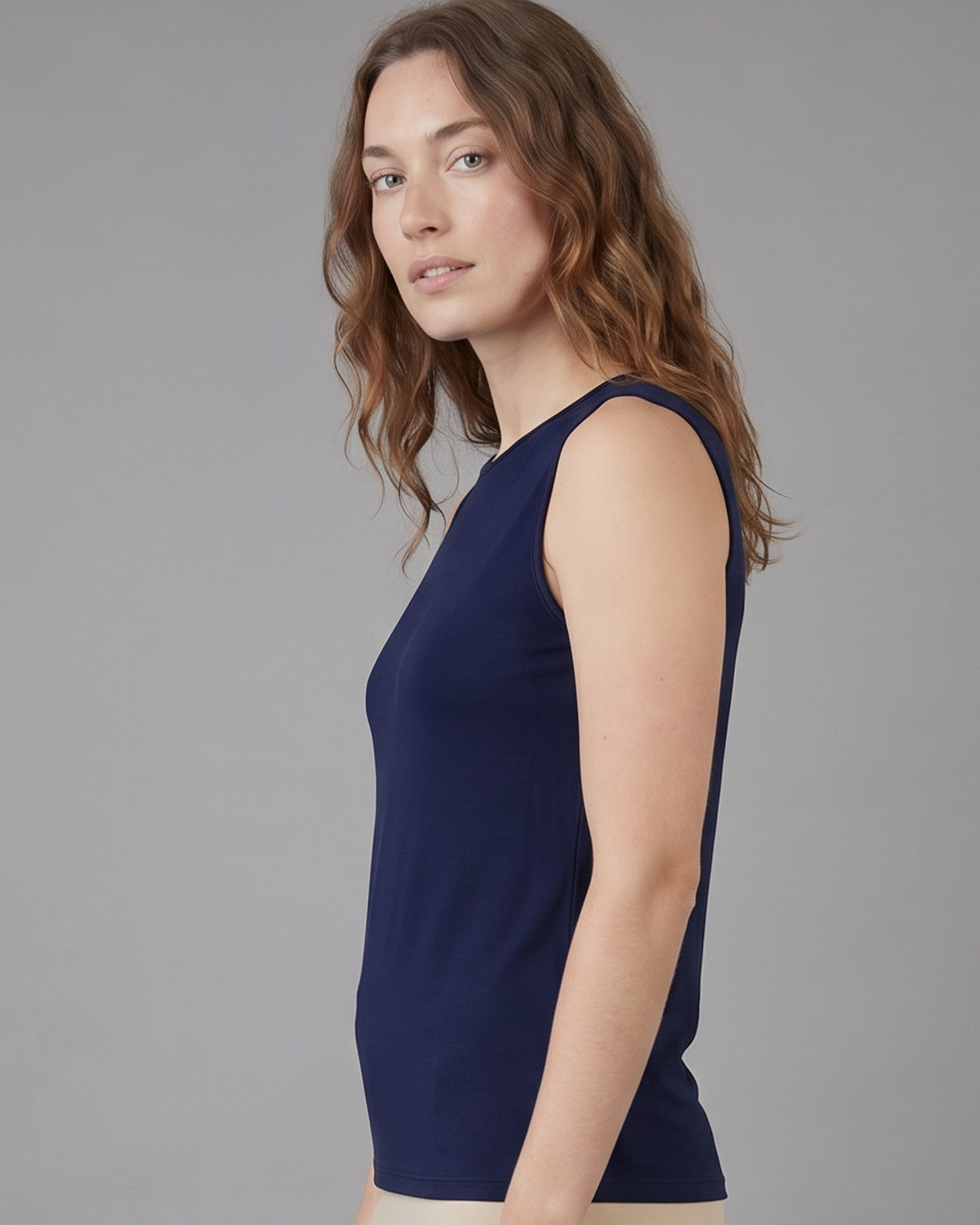 Model wearing Nuggles® Essential Tank in Navy