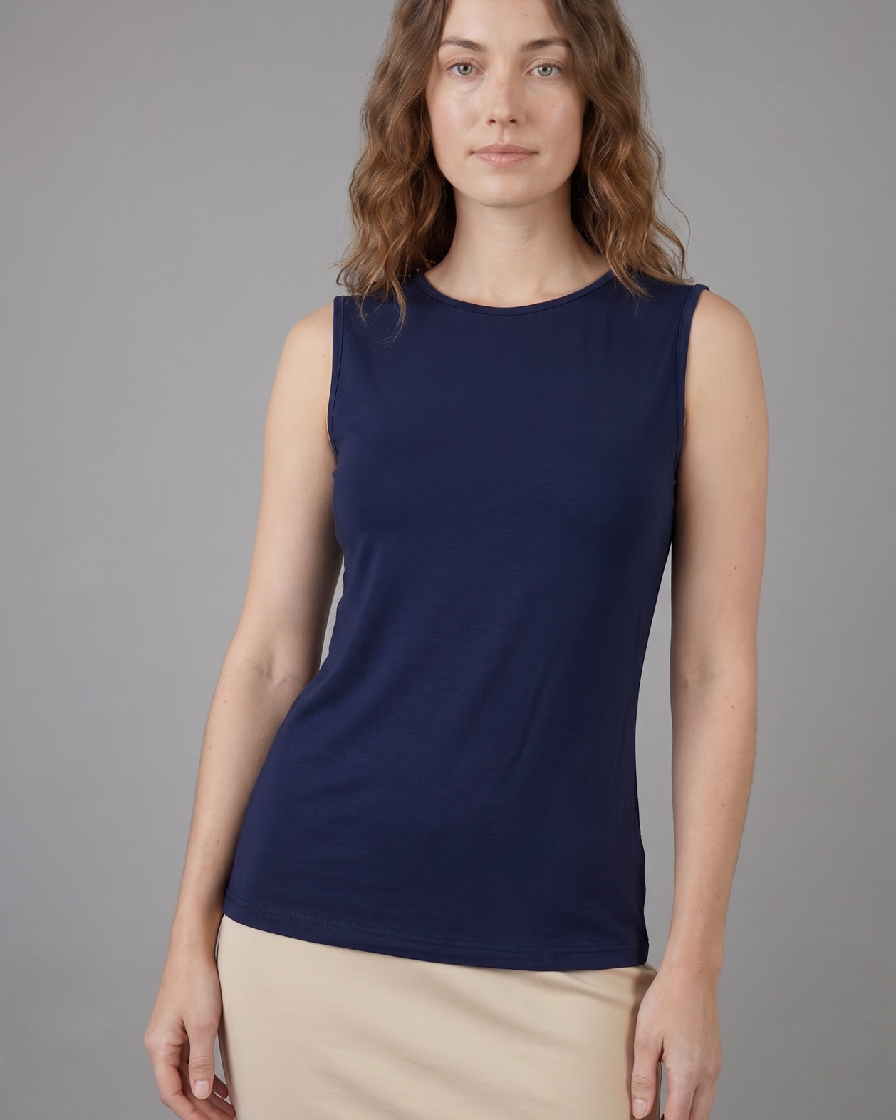 Model wearing Nuggles® Essential Tank in Navy