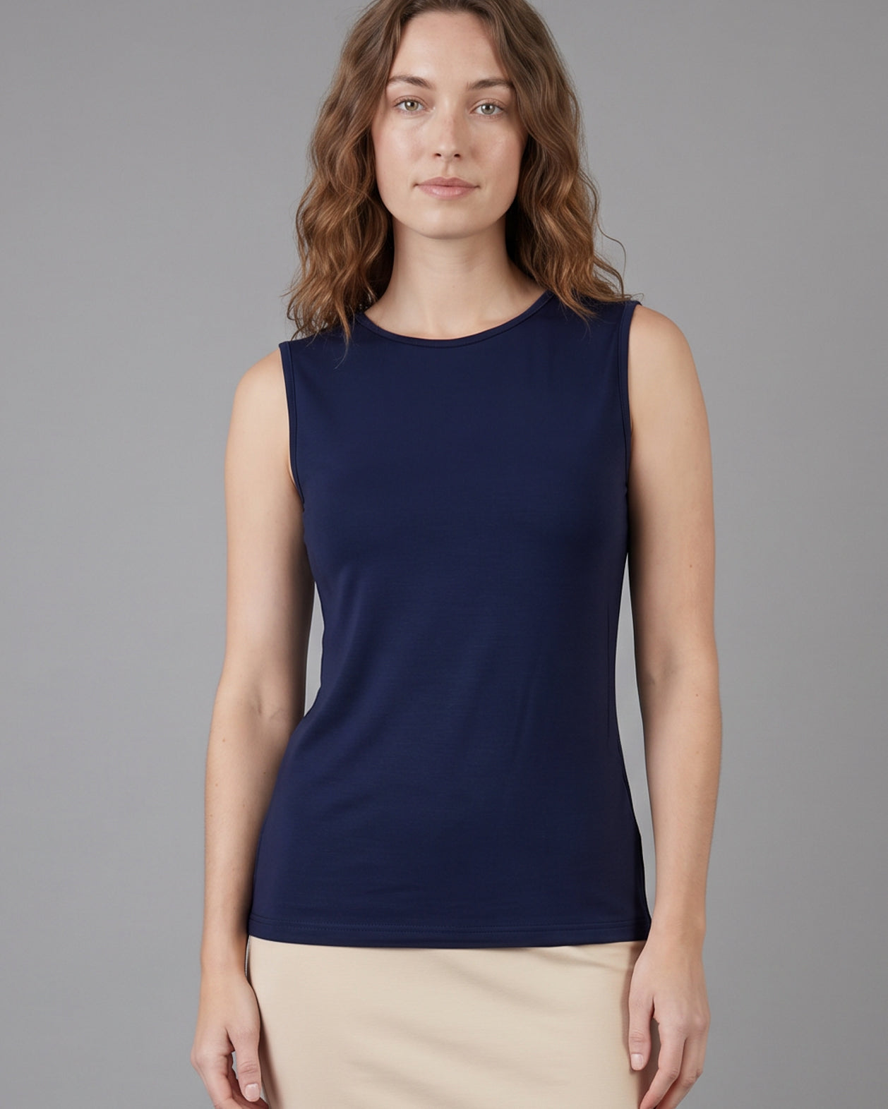 Model wearing Nuggles® Essential Tank in Navy