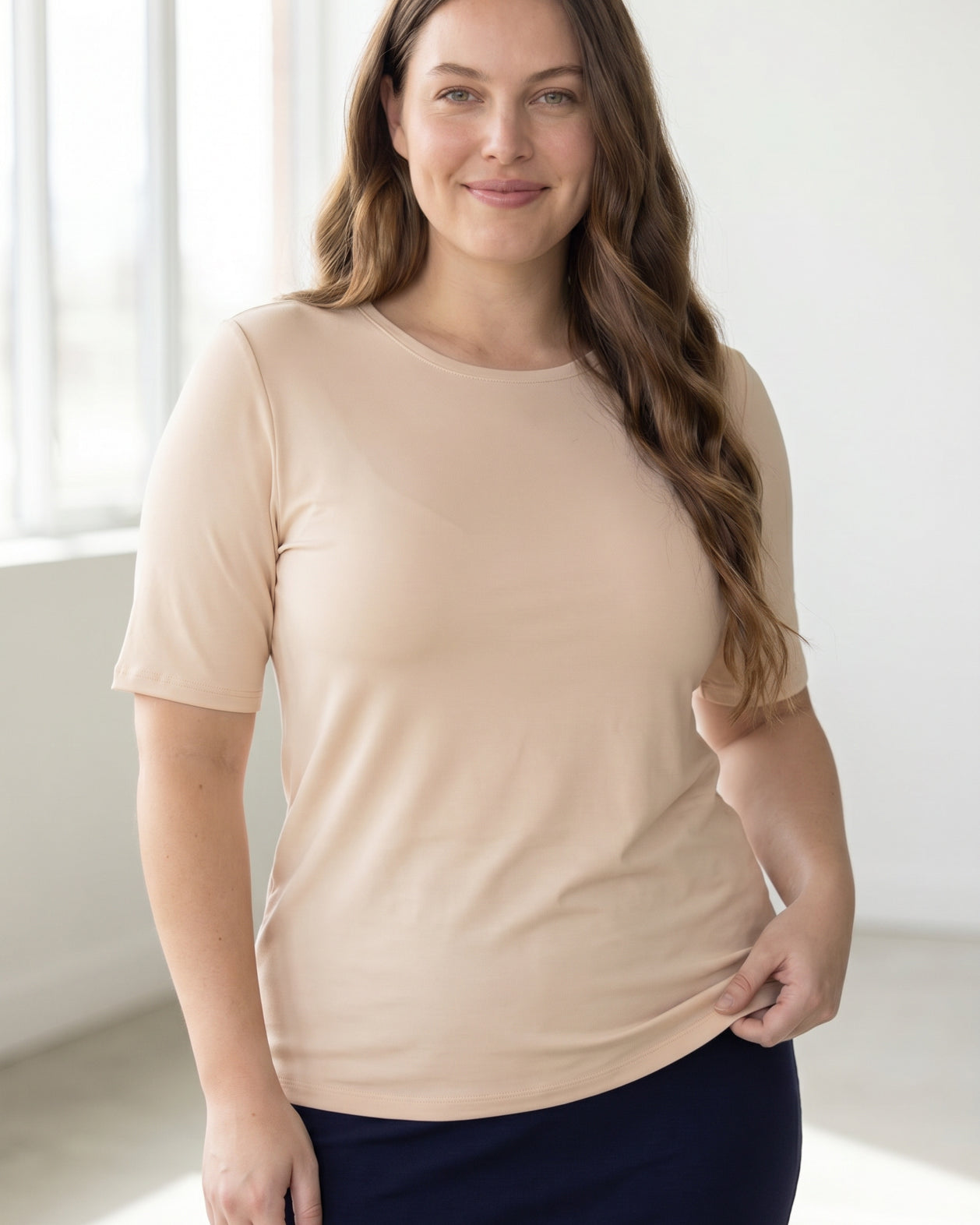 Model wearing the Nuggles® Essential Half Sleeve Tee in Nude