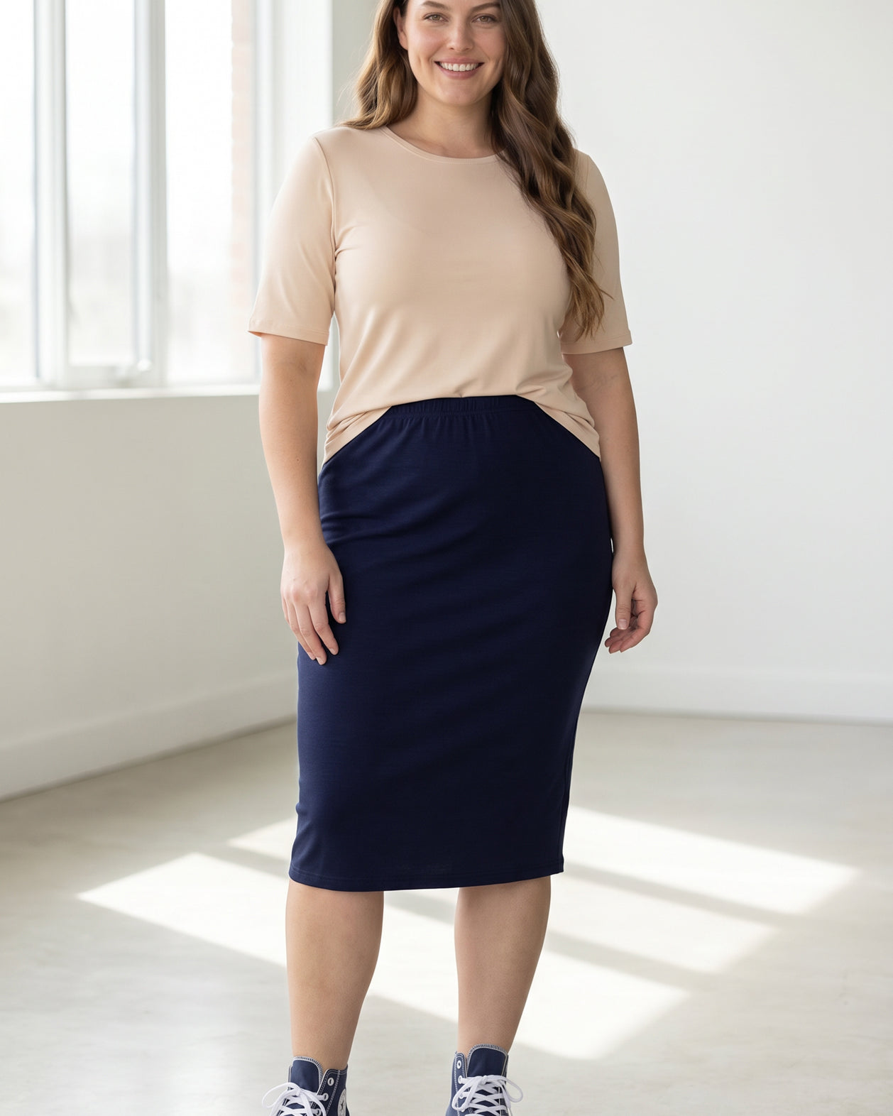 Model wearing the Nuggles® Essential Half Sleeve Tee in Nude