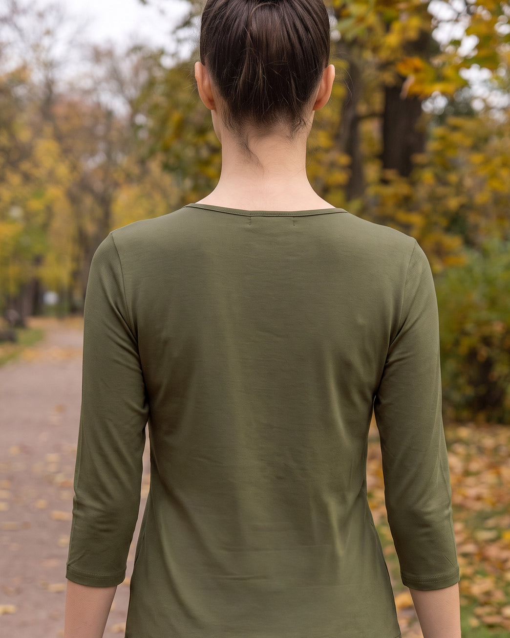 Model wearing Nuggles® Essential 3/4 Sleeve Tee in Olive