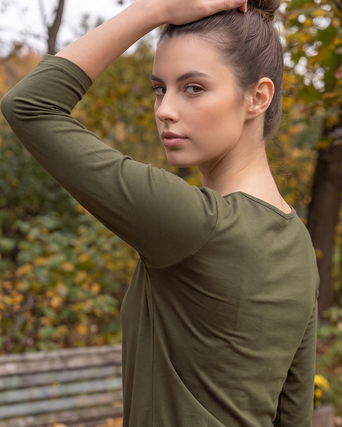 Model wearing Nuggles® Essential 3/4 Sleeve Tee in Olive