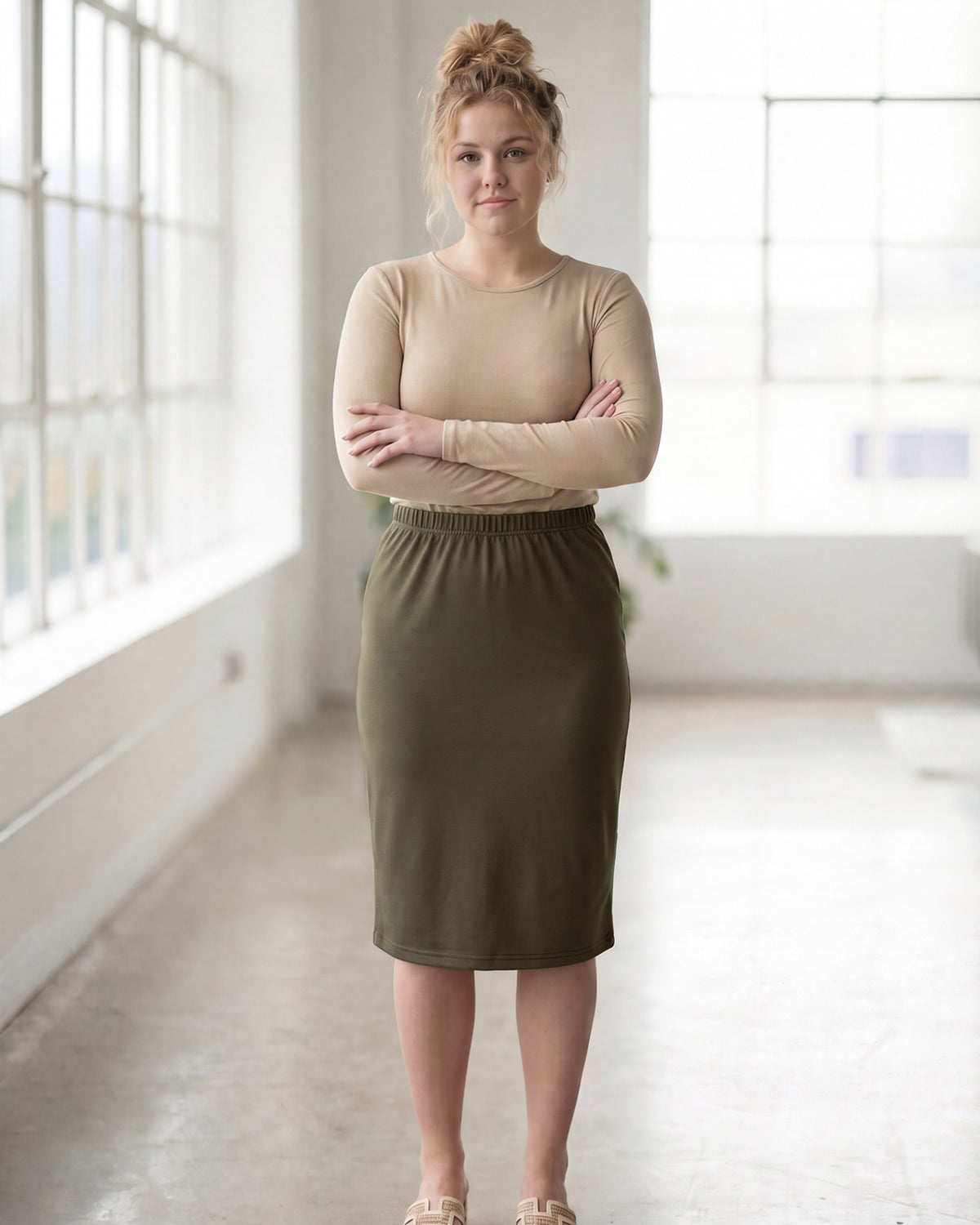 Model wearing Nuggles® 27" Classic Skirt in Olive Brown
