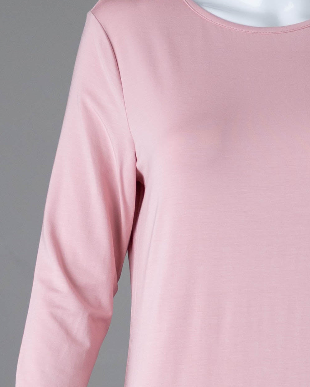 Model wearing Nuggles® Midi Layering Dress in Baby Pink