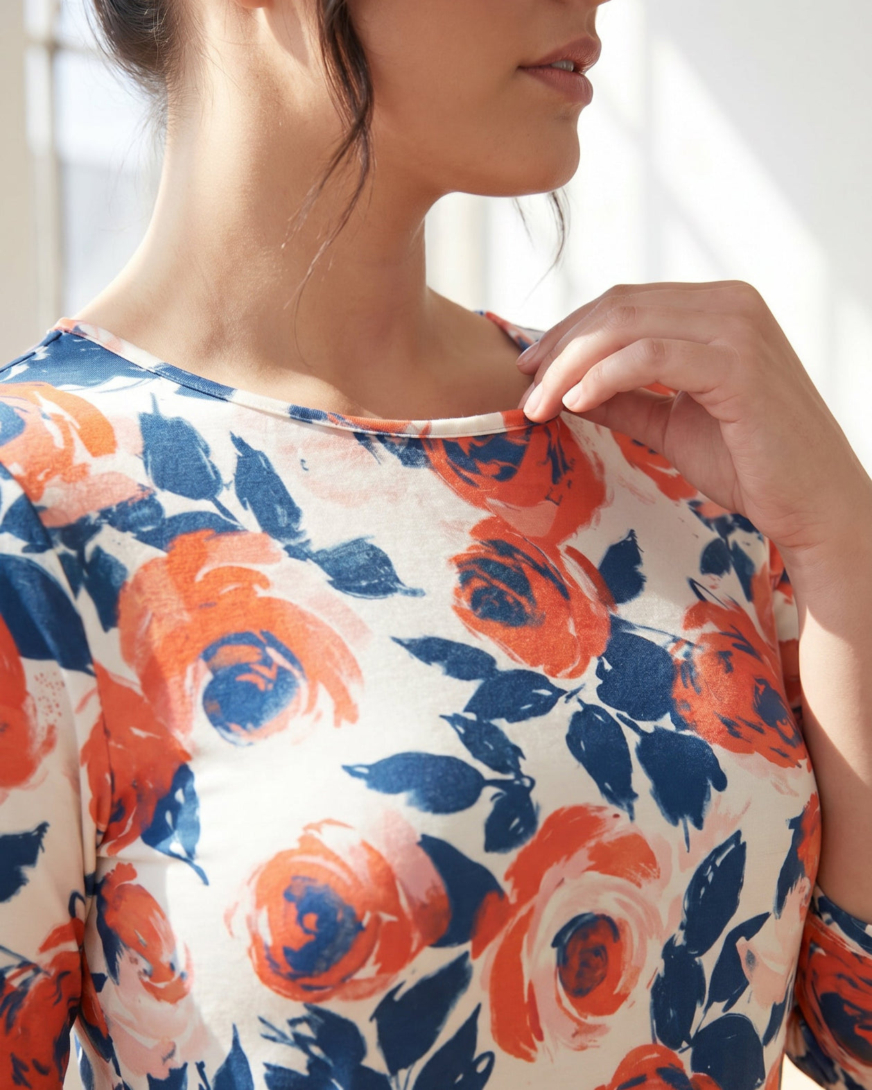 Model wearing Nuggles® 3/4 Essential Tee in Paint Bloom