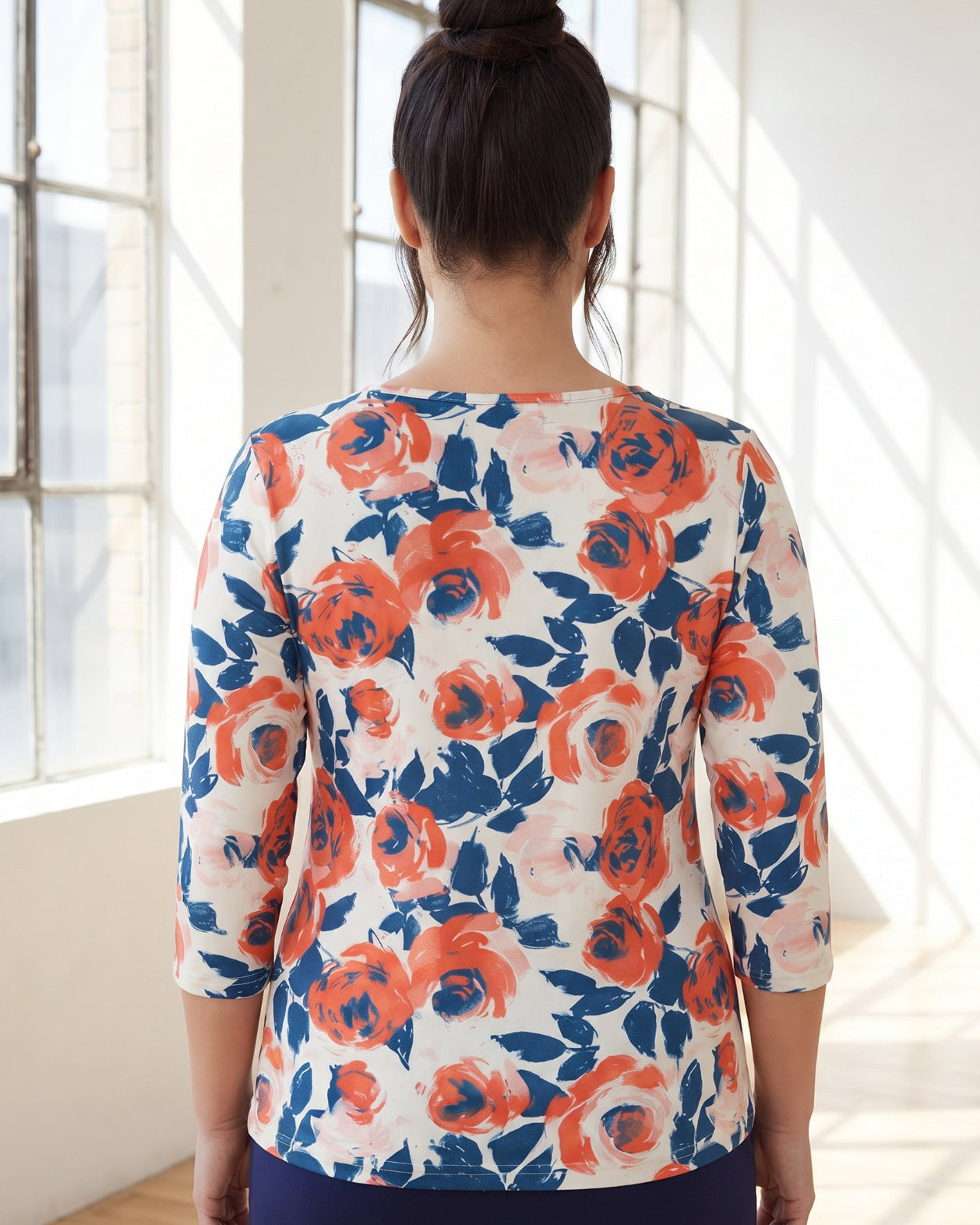 Model wearing Nuggles® 3/4 Essential Tee in Paint Bloom