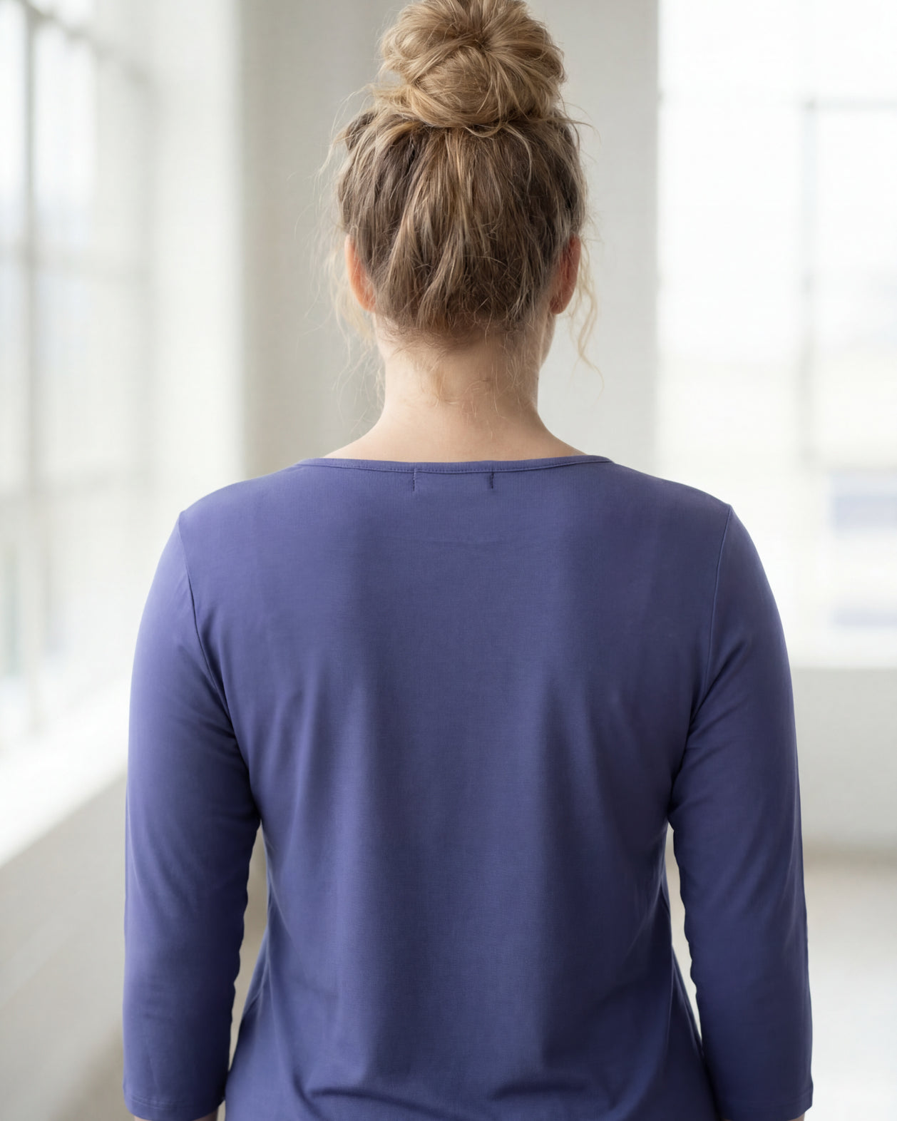Model wearing Nuggles® 3/4 Essential Tee in Periwinkle Purple