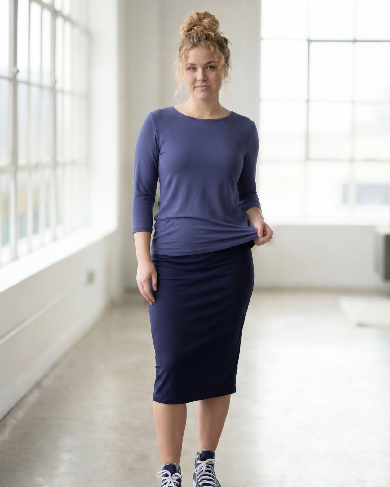 Model wearing Nuggles® 3/4 Essential Tee in Periwinkle Purple