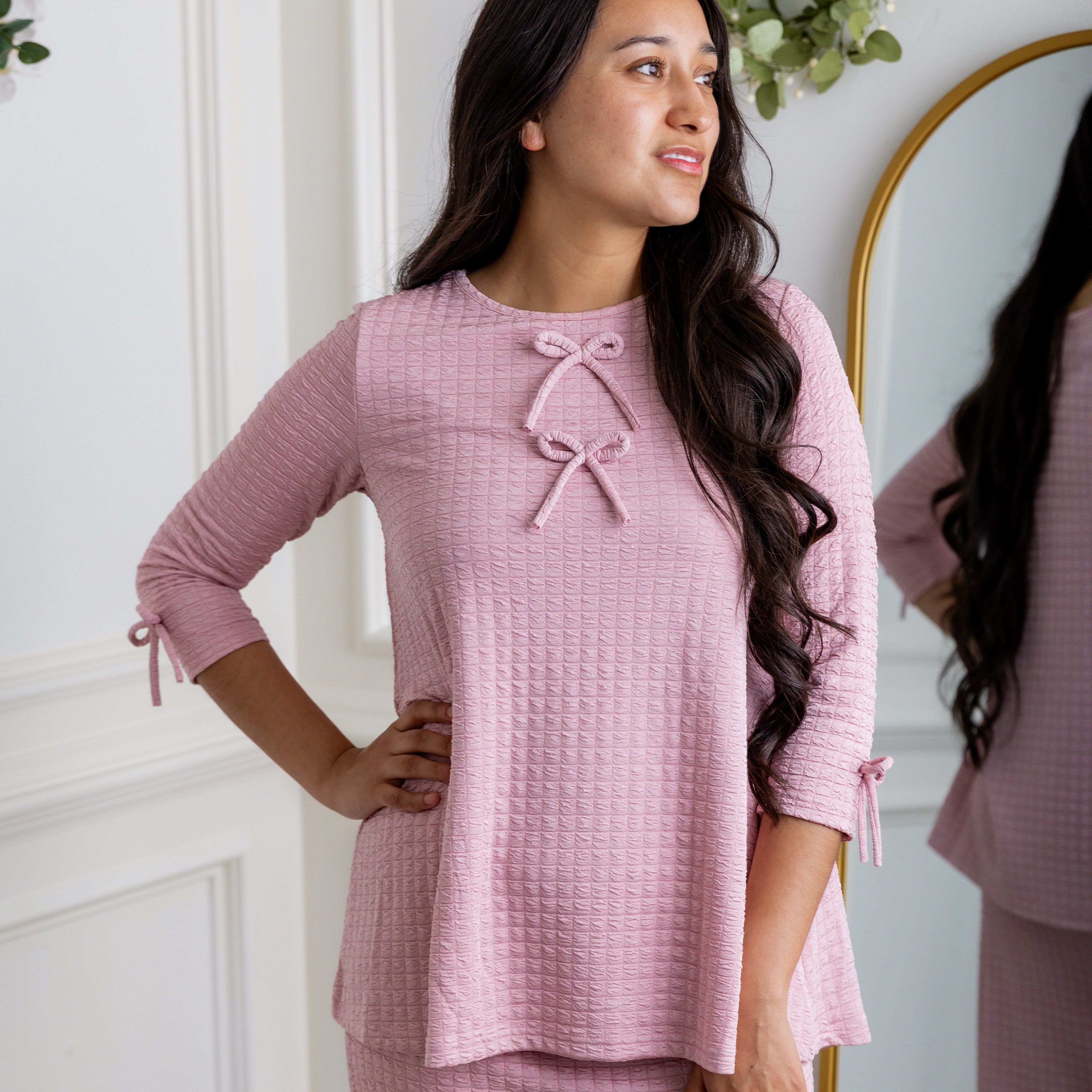 Nuggles® Lexi Top in waffle knit with 3/4 sleeves, bow detail, and modest A-line fit for women