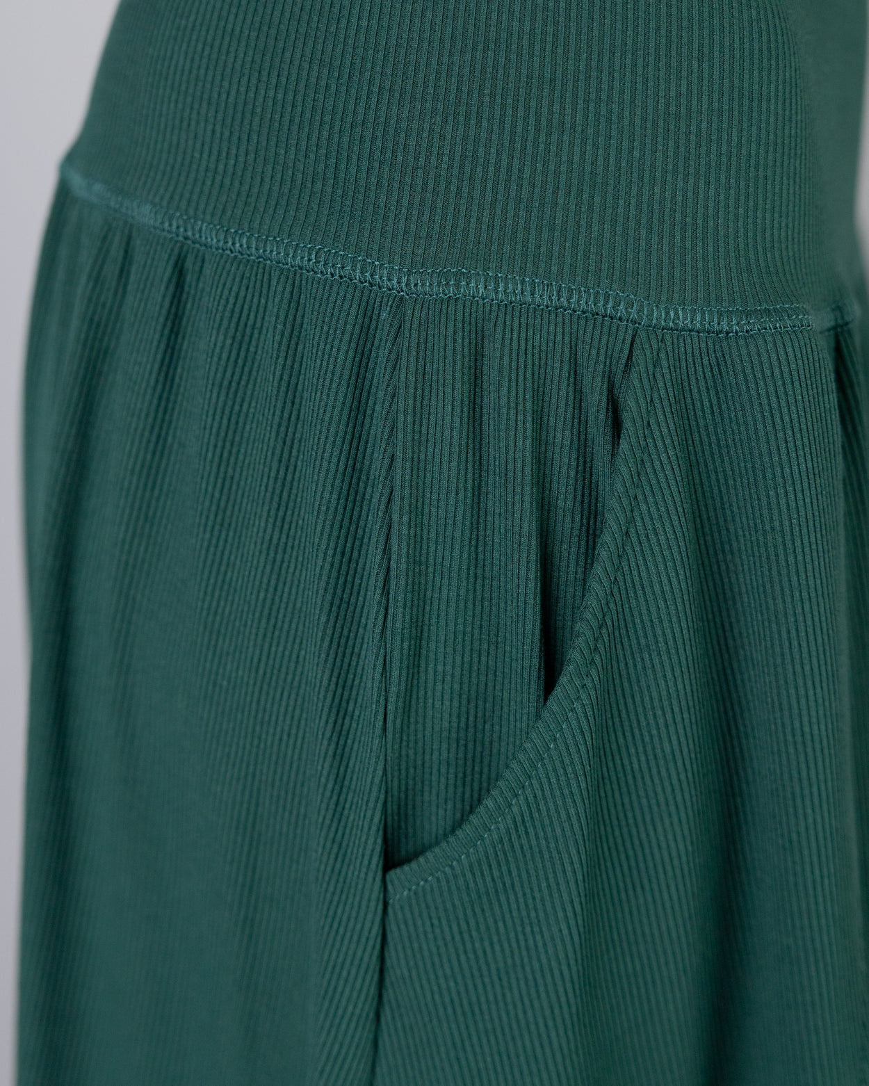 Model wearing Nuggles® Bethany Shirt & Skirt in Pine Green