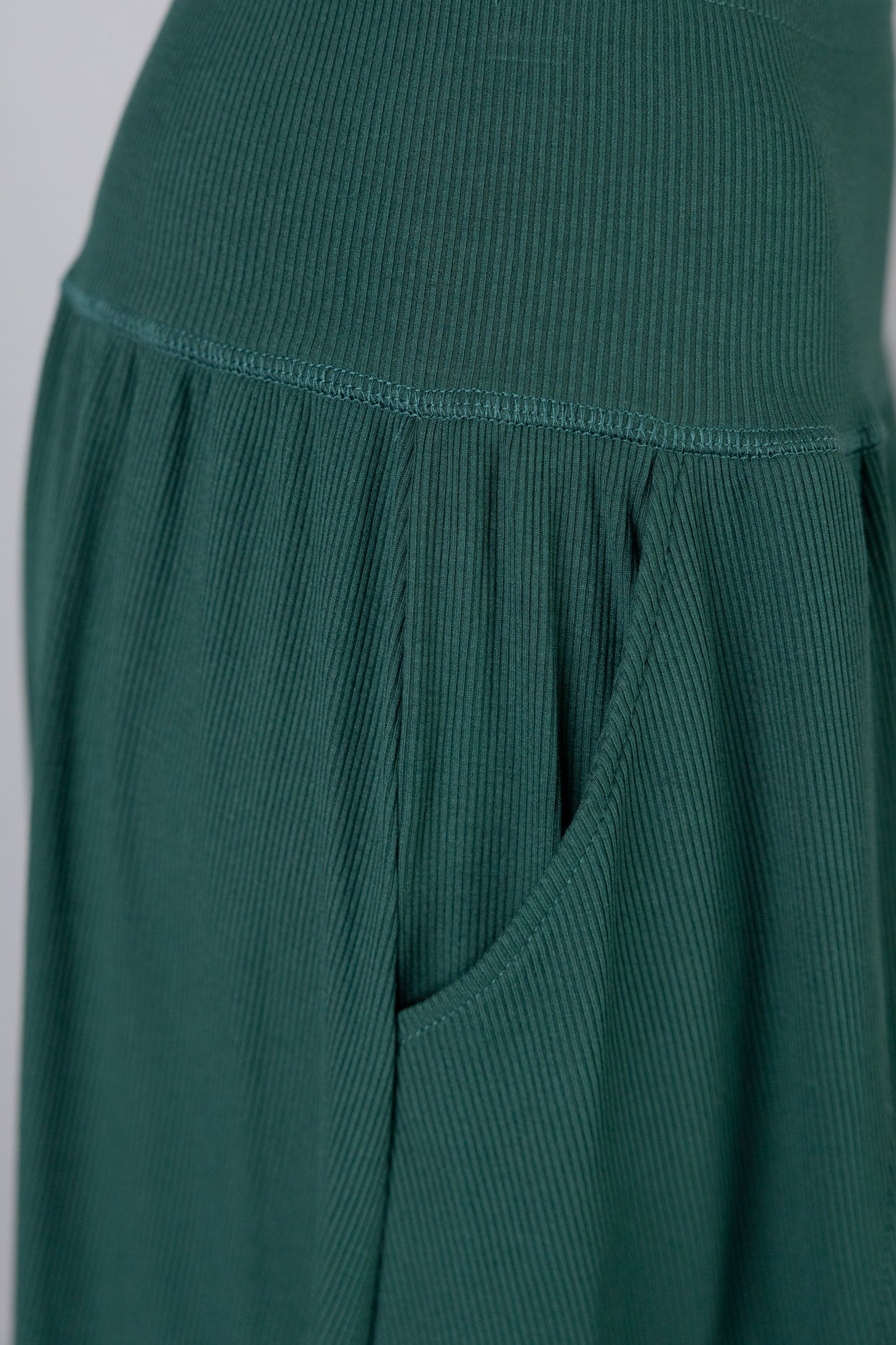 Model wearing Nuggles® Bethany Shirt & Skirt in Pine Green