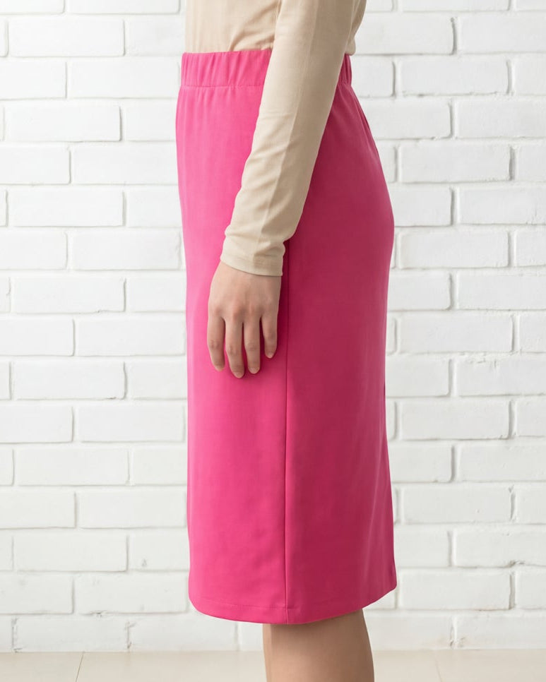 Model wearing Nuggles® 25" Relaxed Midi Skirt in Pink