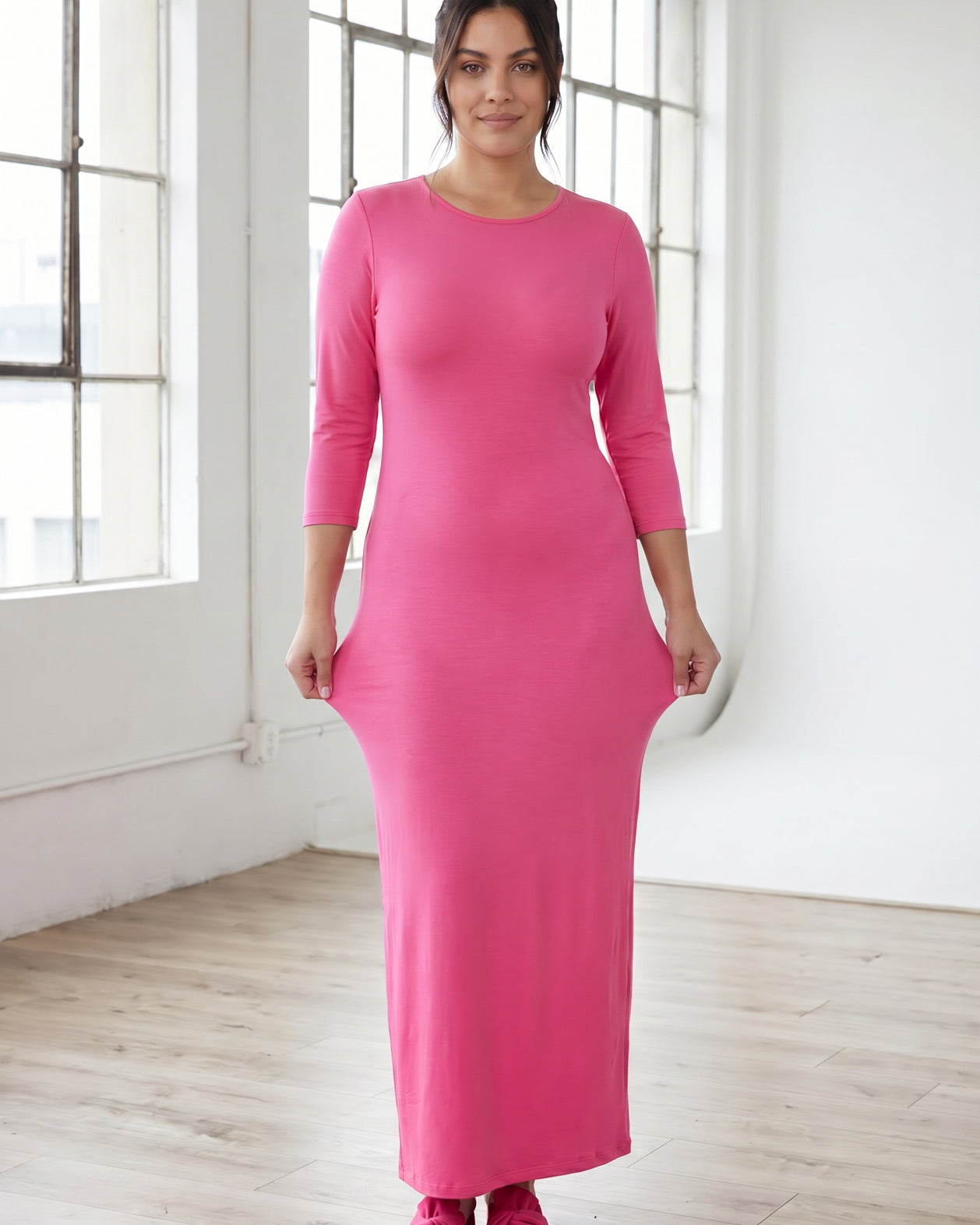 Model wearing Nuggles® MaxiLayering Dress in Pink