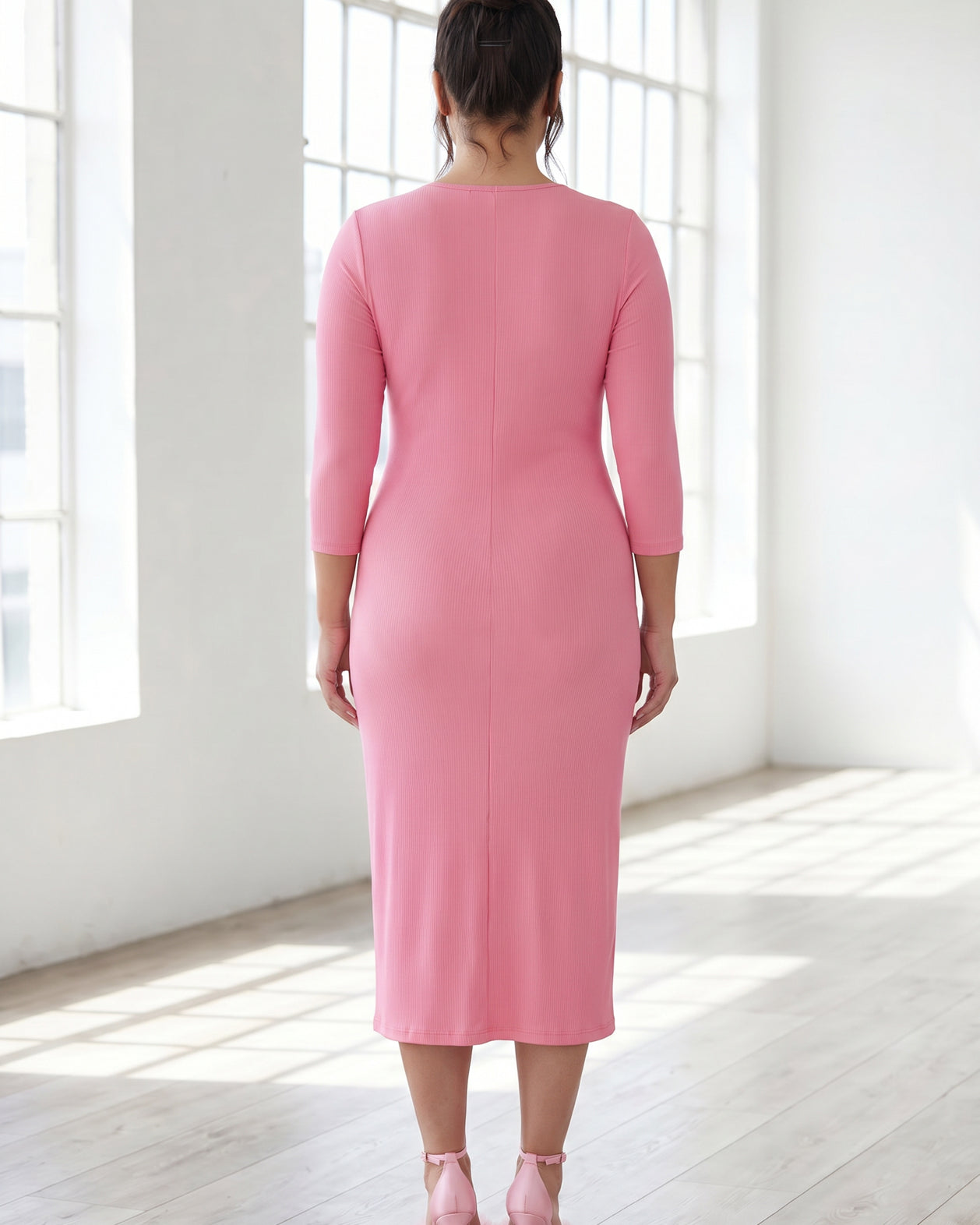 Model wearing Nuggles® Ribbed Midi Layering Dress in Pink