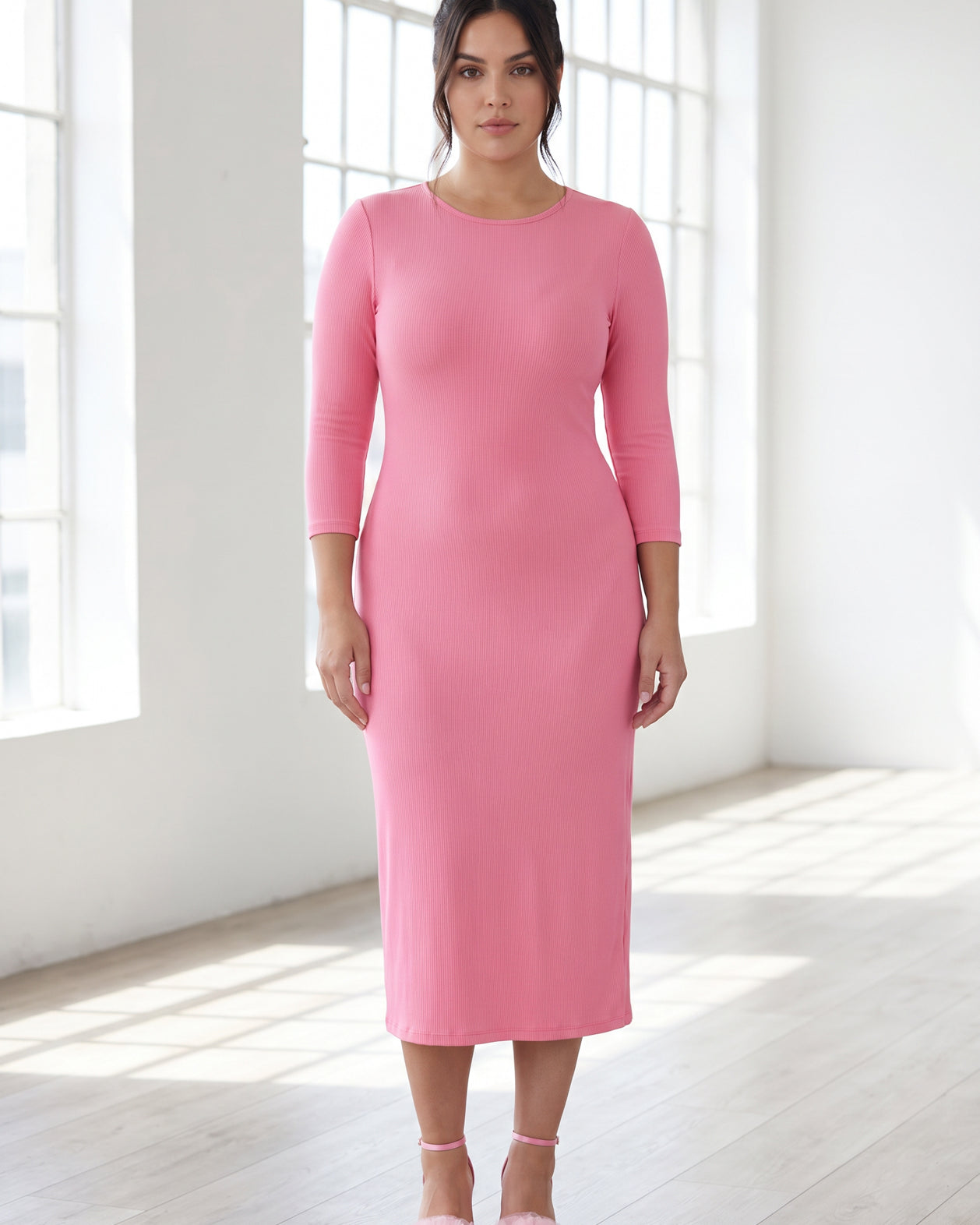 Model wearing Nuggles® Ribbed Midi Layering Dress in Pink