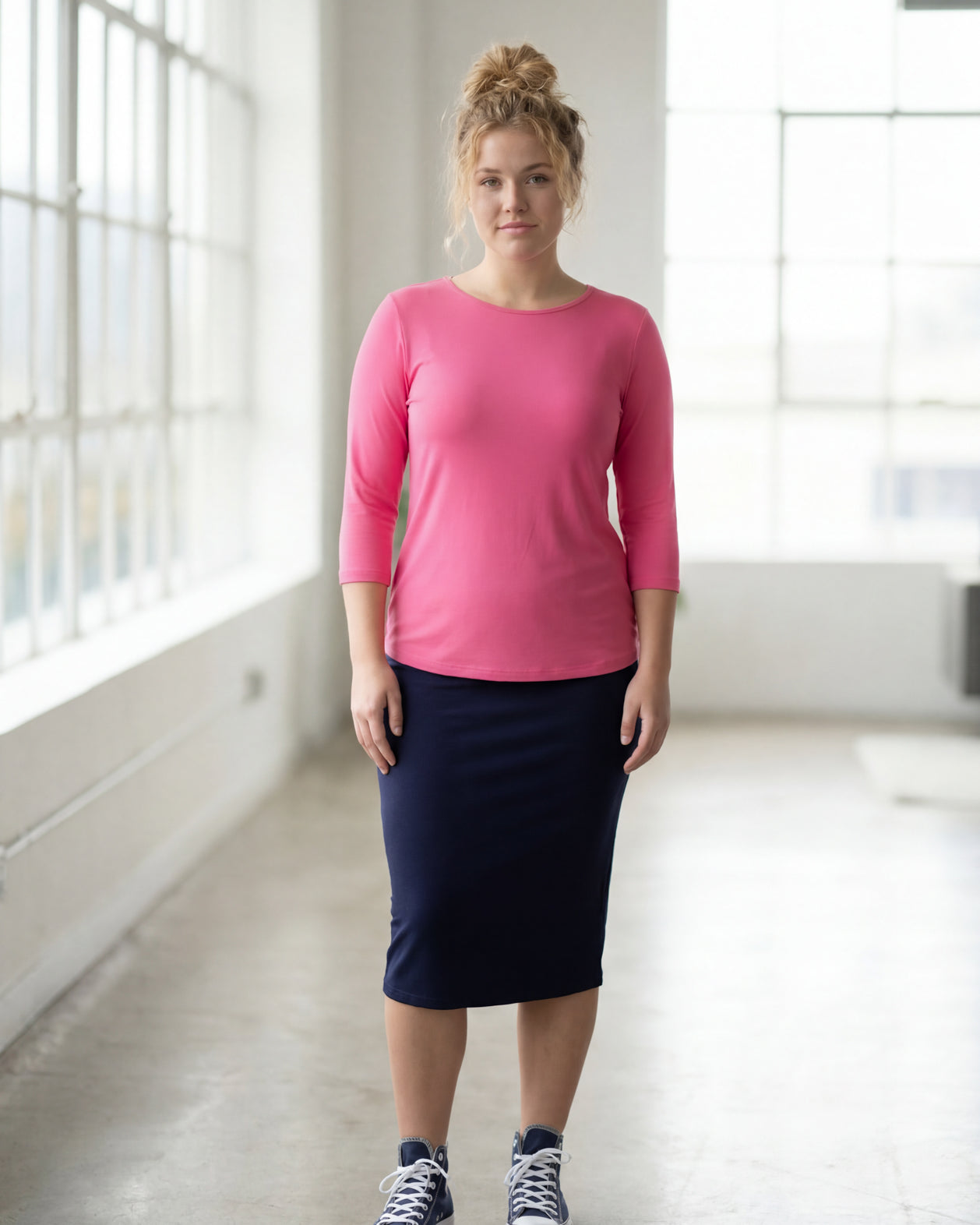 Model wearing Nuggles® 3/4 Essential Tee in Pink