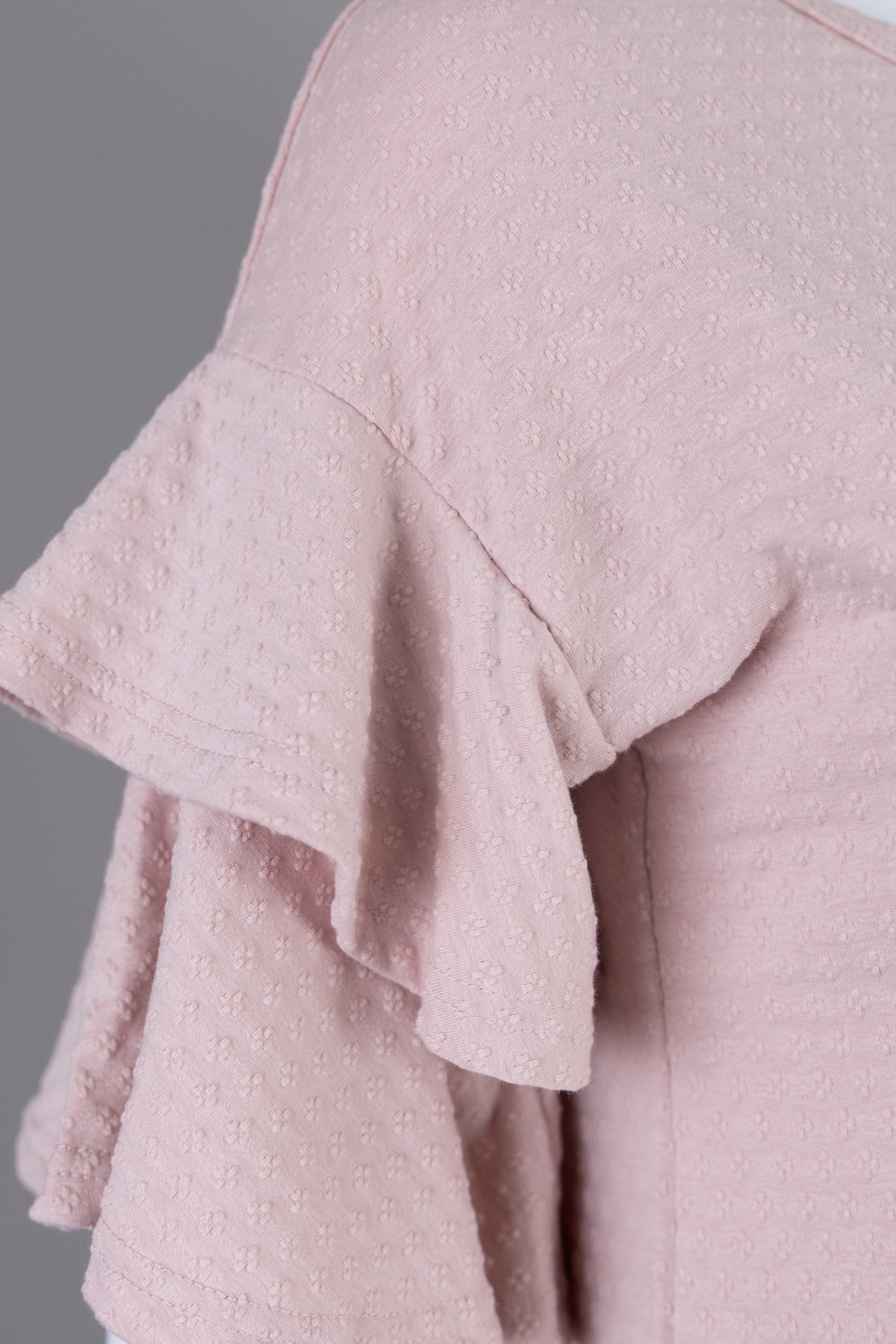Model wearing Nuggles® Helena Top in Dusty Pink