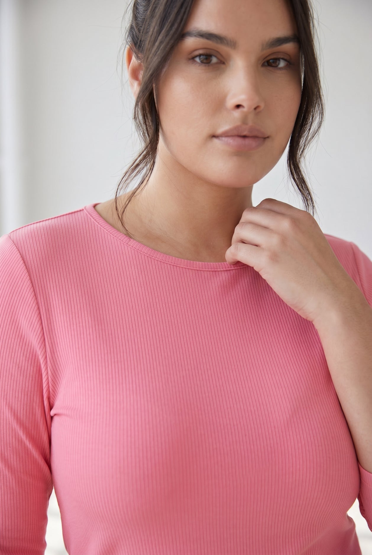 Model wearing Nuggles® 3/4 Essential Ribbed Tee in Pink