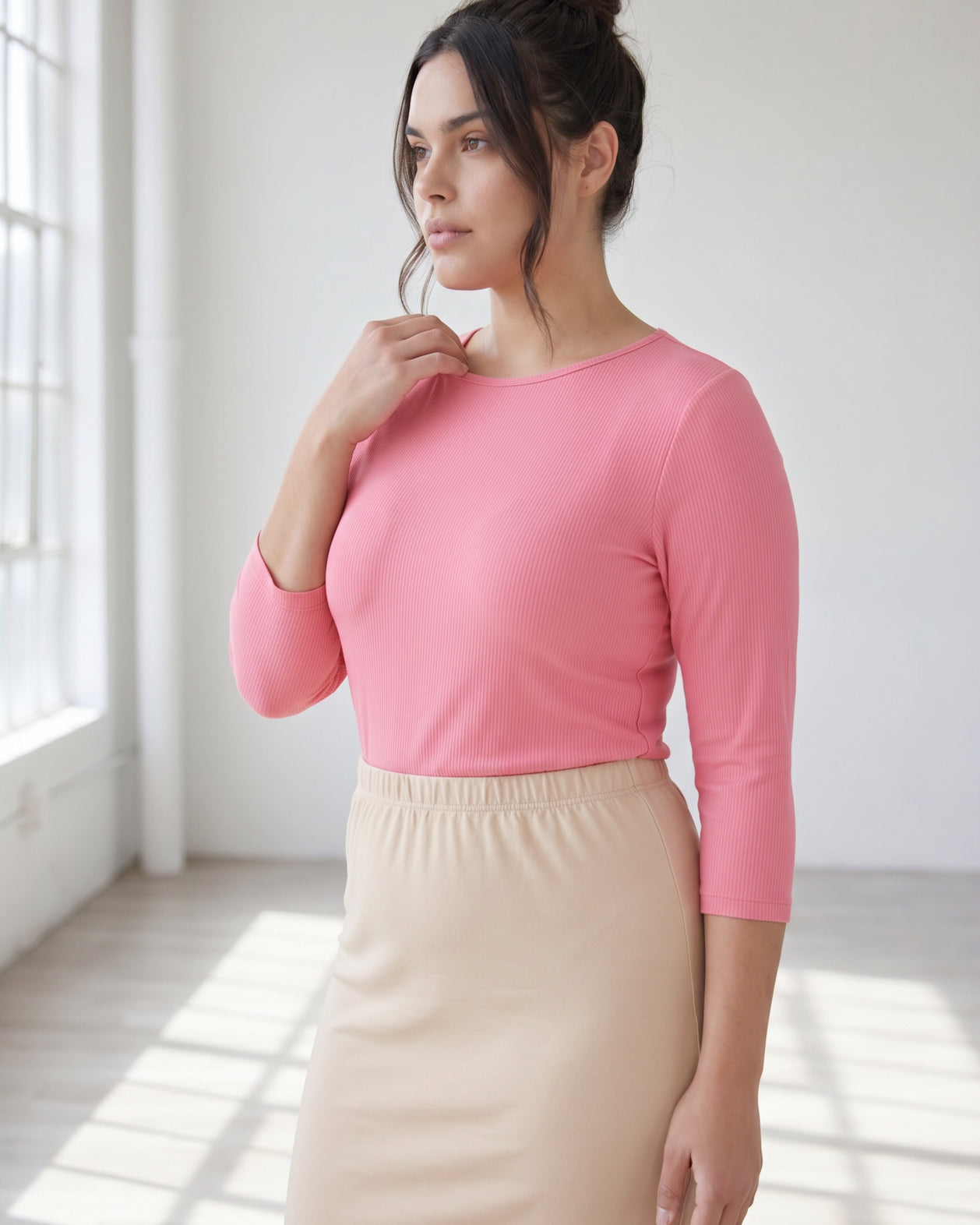 Model wearing Nuggles® 3/4 Essential Ribbed Tee in Pink