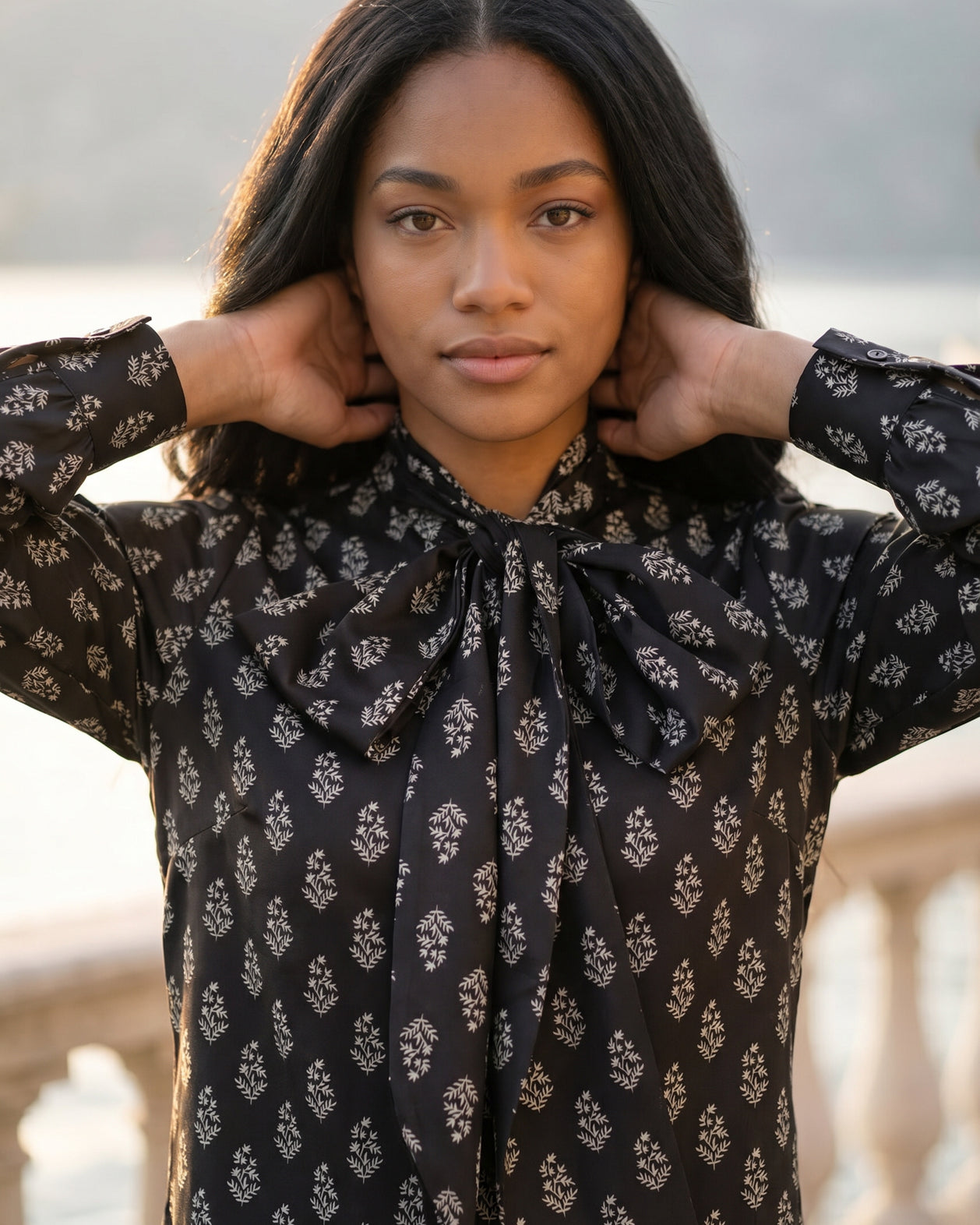 Nuggles® Felicity Bow Top in Quiet Black elegant womens blouse with feminine bow detail