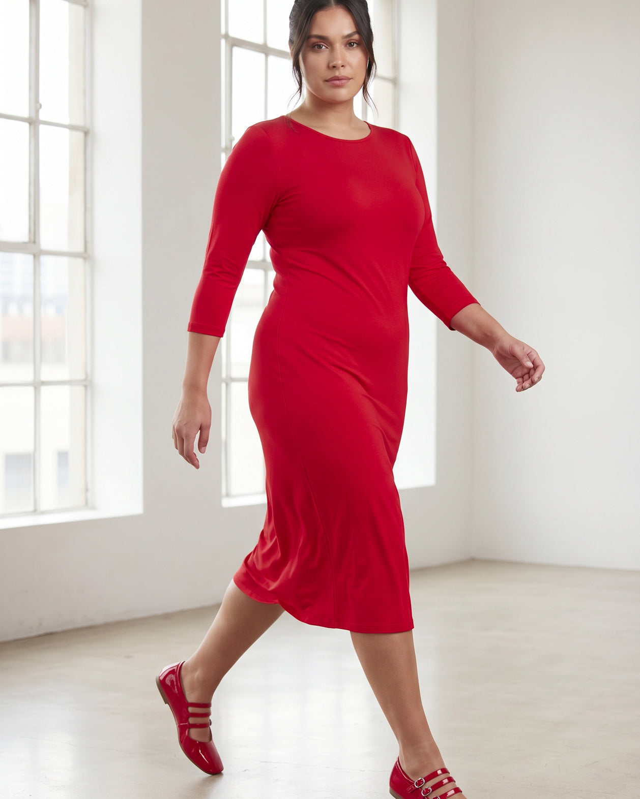 Model wearing Nuggles® Midi Layering Dress in Red