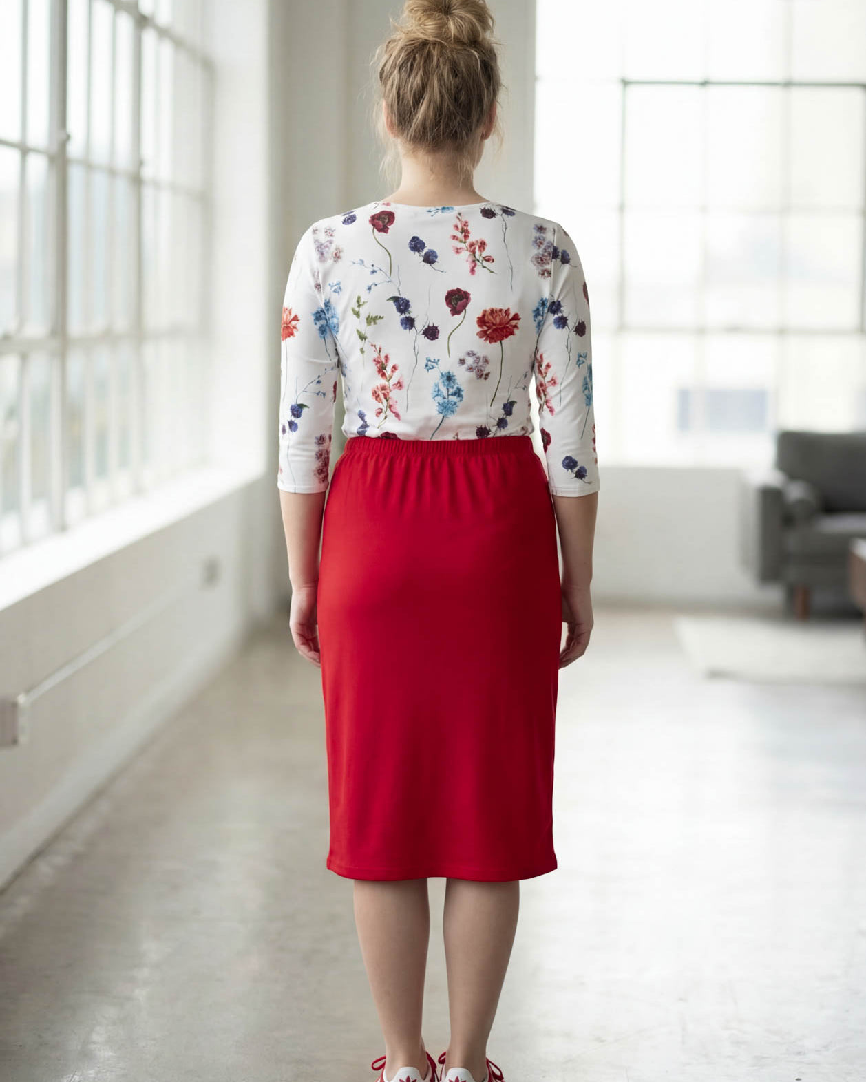 Model wearing Nuggles® 27" Classic Skirt in Red