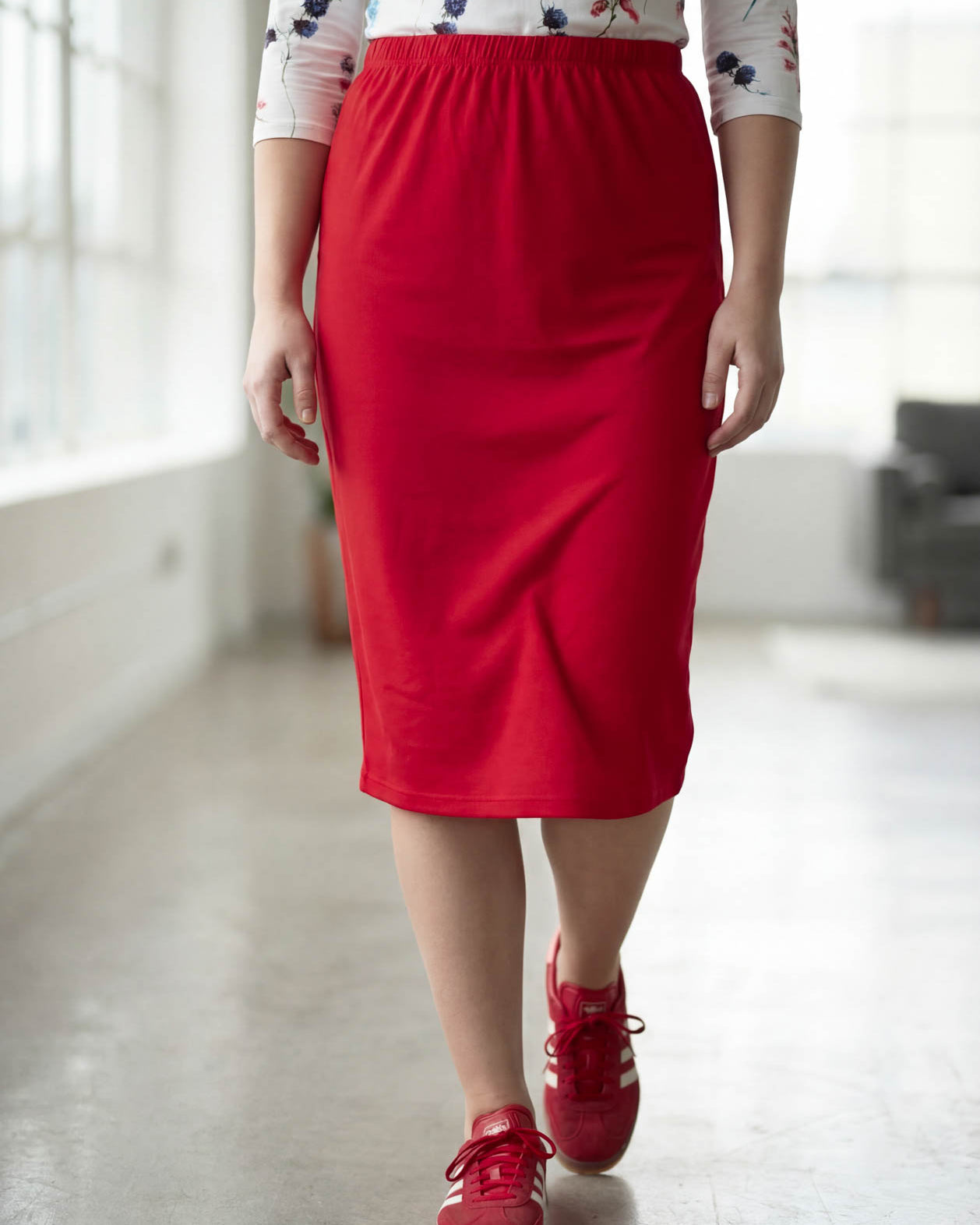 Model wearing Nuggles® 27" Classic Skirt in Red