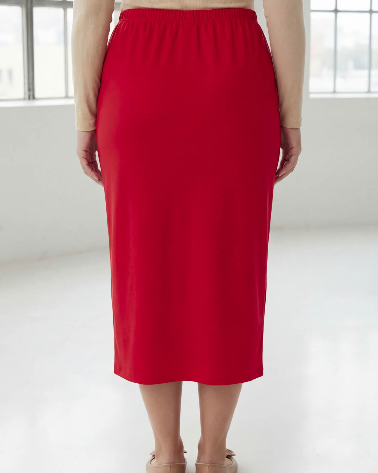 Model wearing Nuggles® 31" Classic Skirt in Red